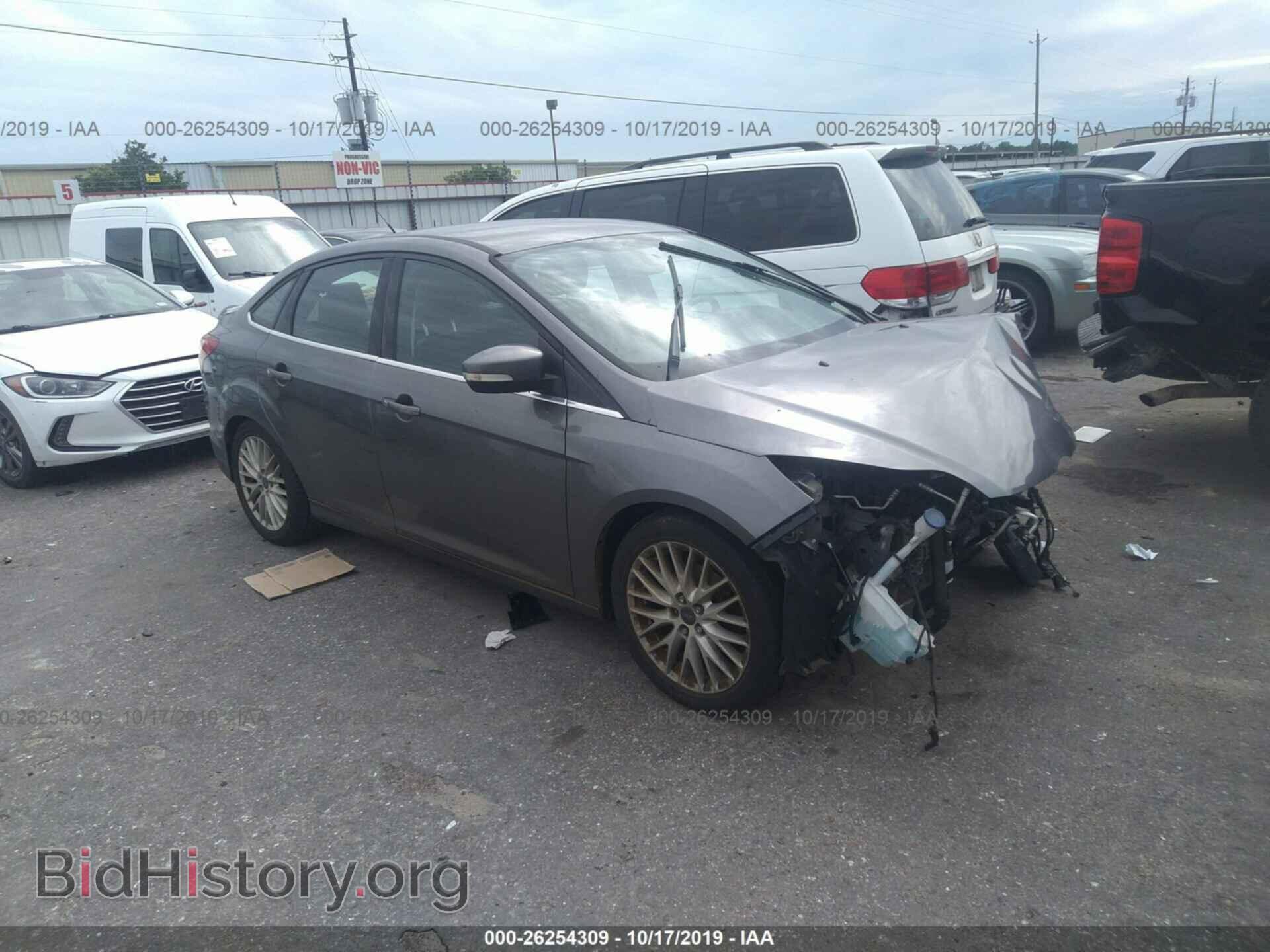 Фотография 1FADP3J21EL419761 - FORD FOCUS 2014