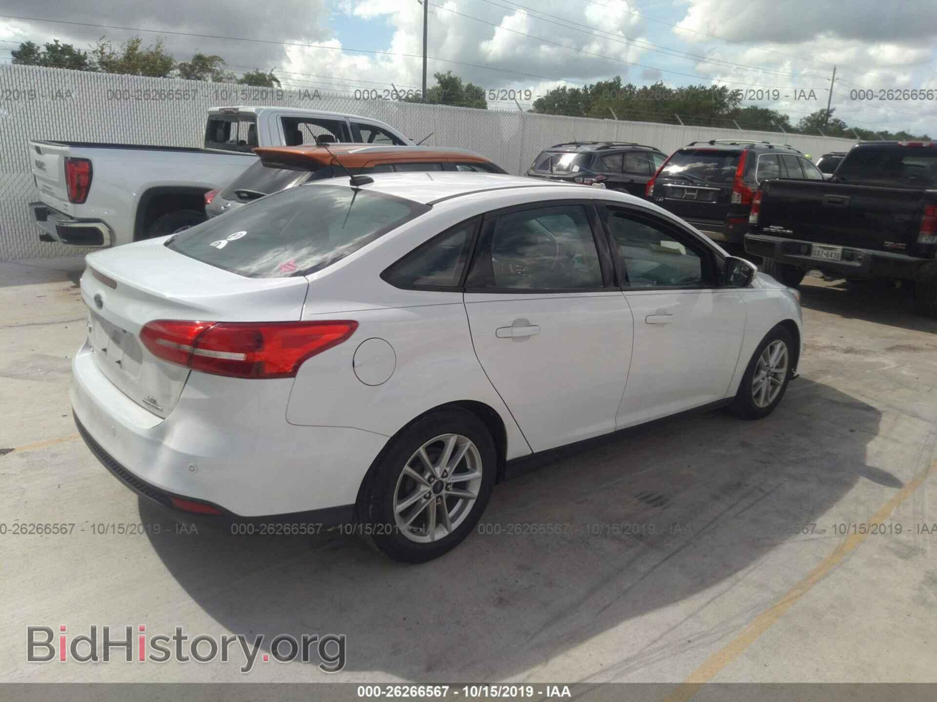 2015 FORD FOCUS - VIN: 1FADP3F29FL338940 - Photo 4