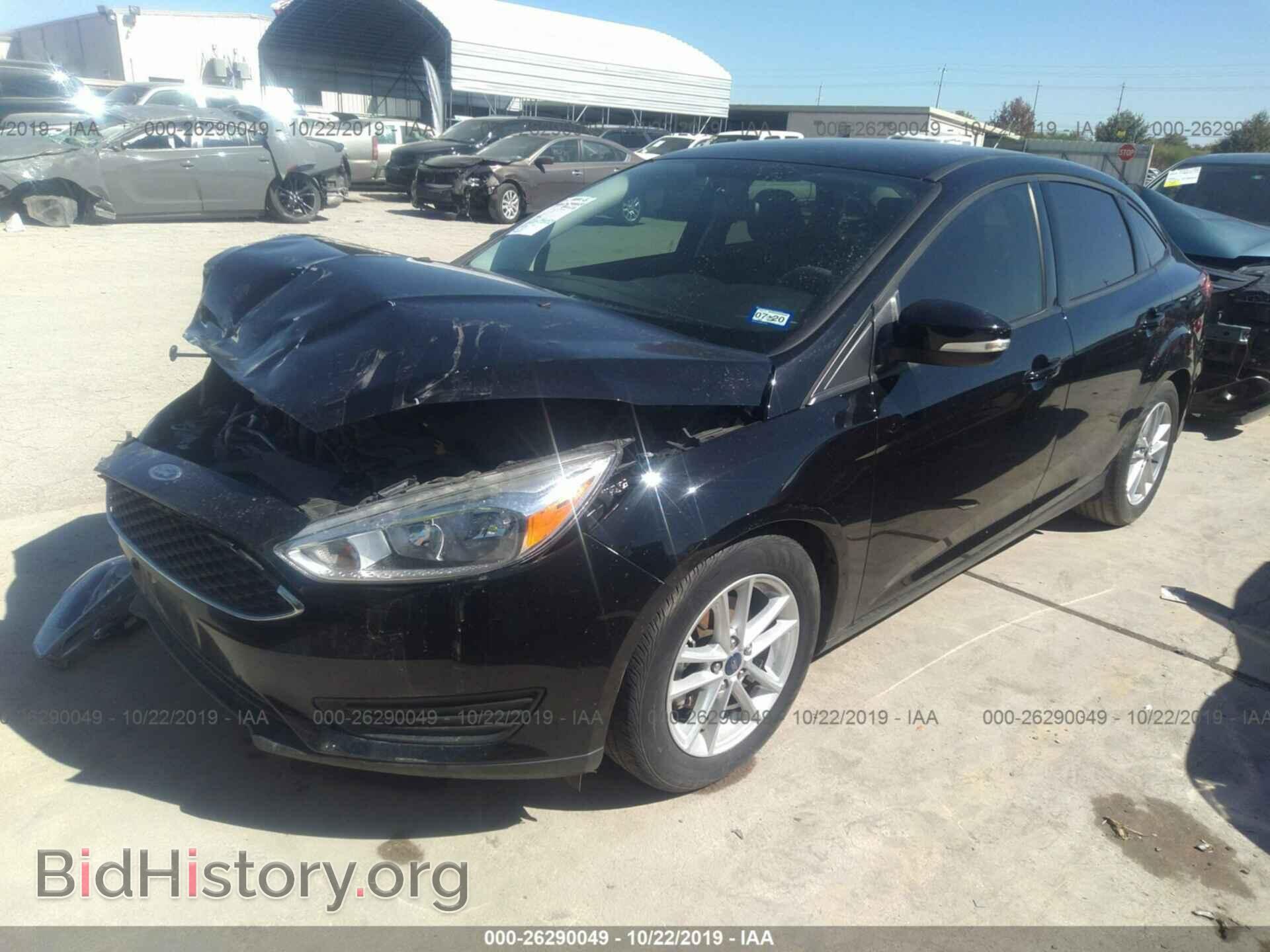 2016 FORD FOCUS - VIN: 1FADP3F21GL328713 - Фото 2