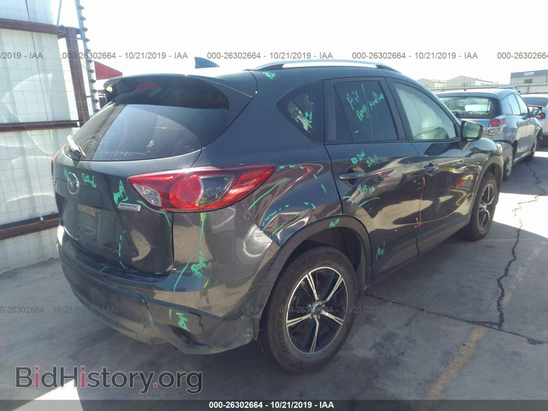 2016 MAZDA CX-5 - VIN: JM3KE2CY0G0691068 - Фото 4