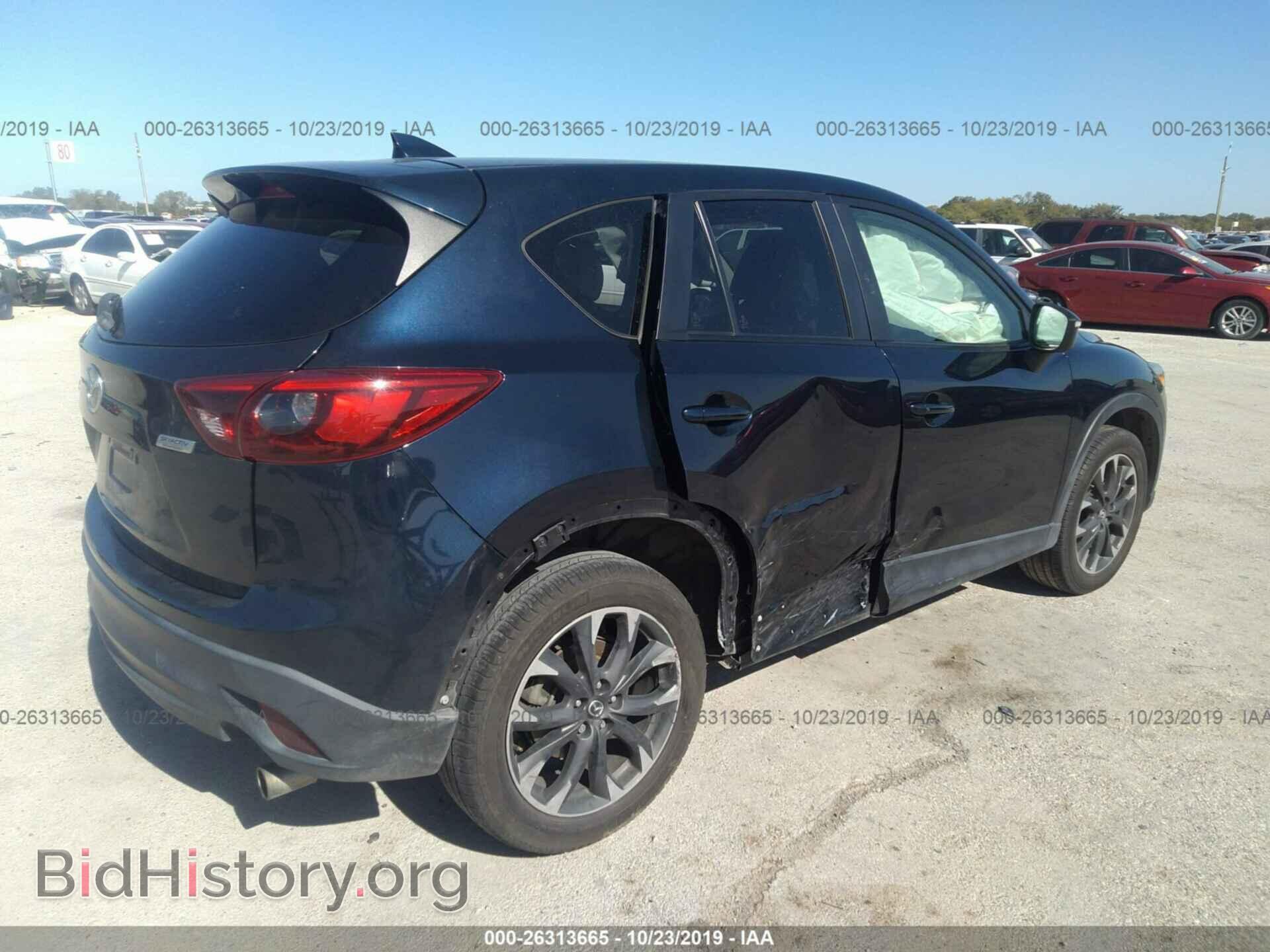 2016 MAZDA CX-5 - VIN: JM3KE2DY9G0660805 - Photo 4