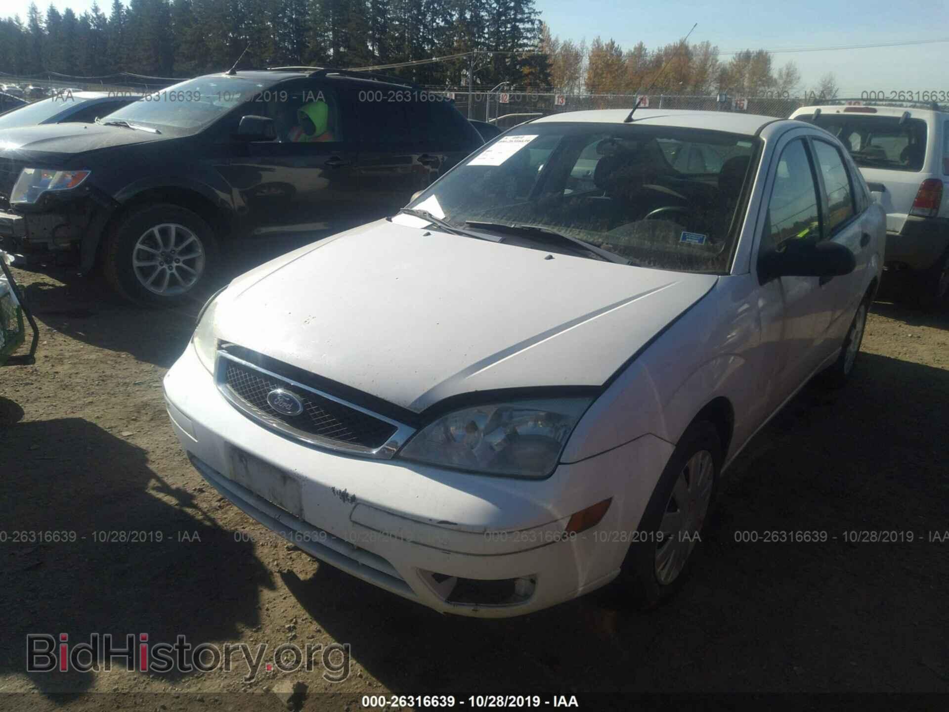 2007 Ford Focus - VIN: 1FAFP34N77W113986 - Фото 2