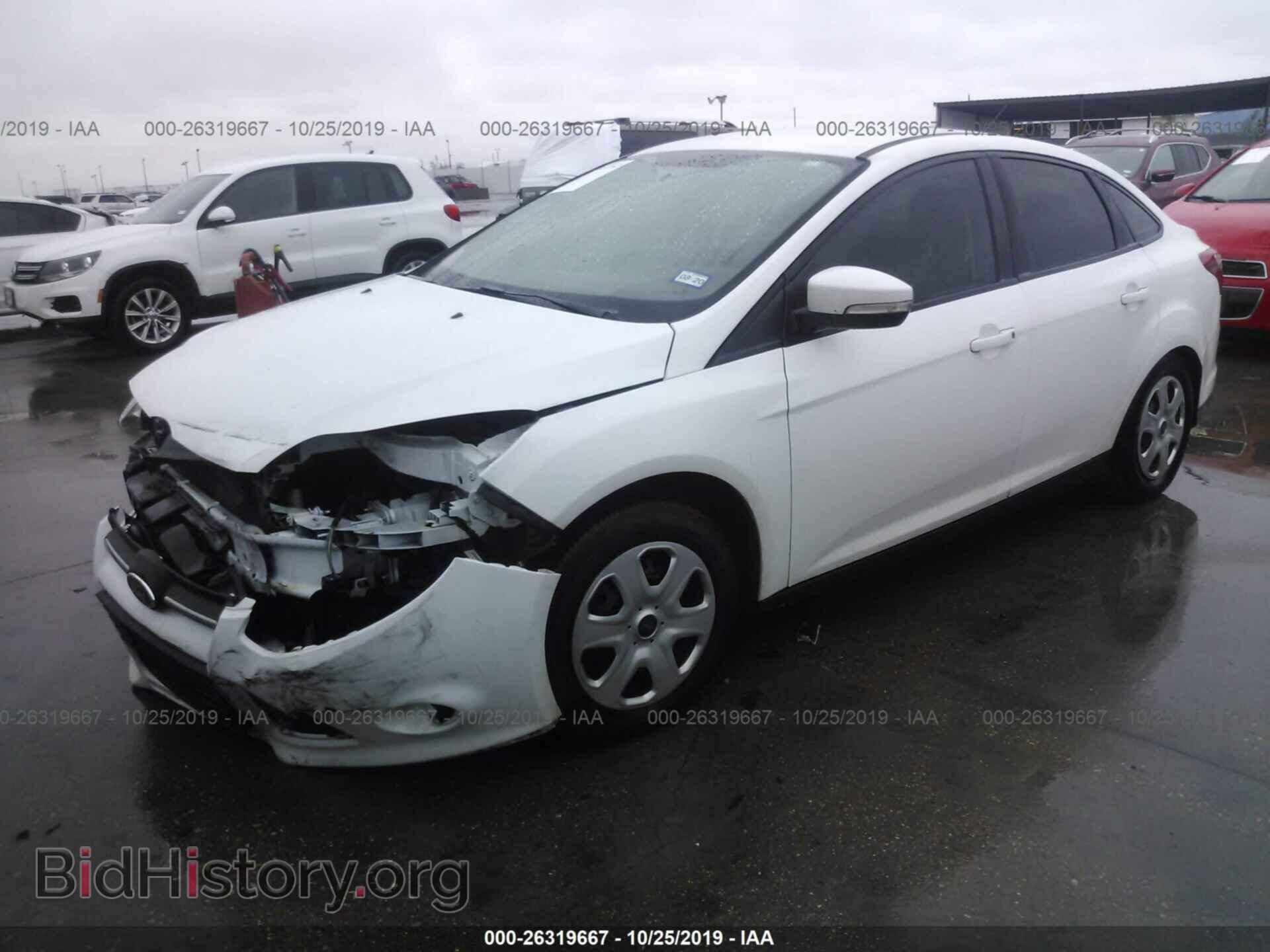 2014 Ford Focus - VIN: 1FADP3F26EL130058 - Photo 2