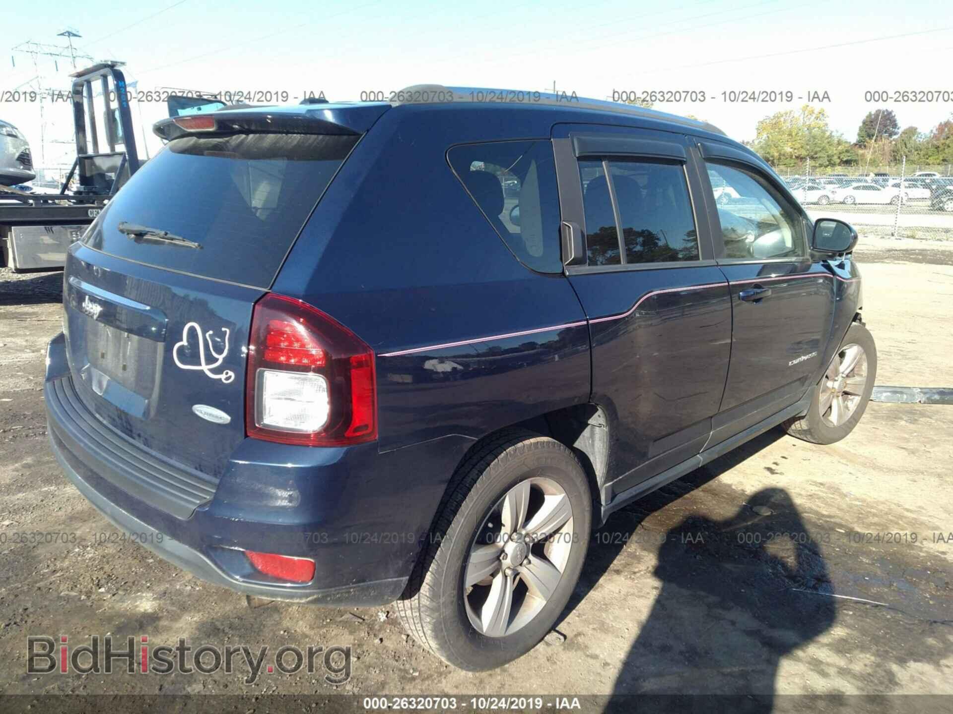 2014 JEEP COMPASS - VIN: 1C4NJDEB7ED898472 - Photo 4