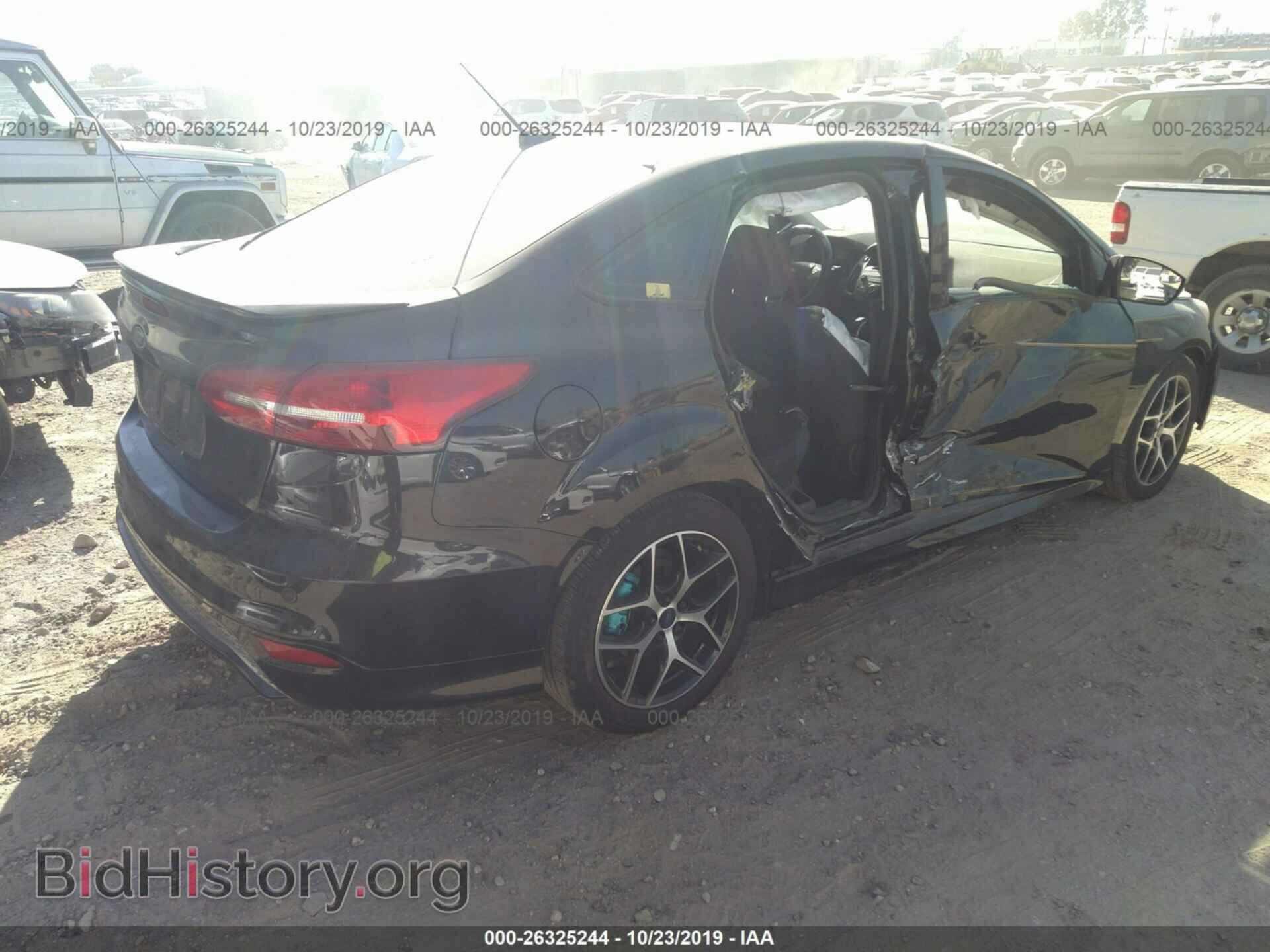 2016 FORD FOCUS - VIN: 1FADP3F21GL392086 - Photo 4
