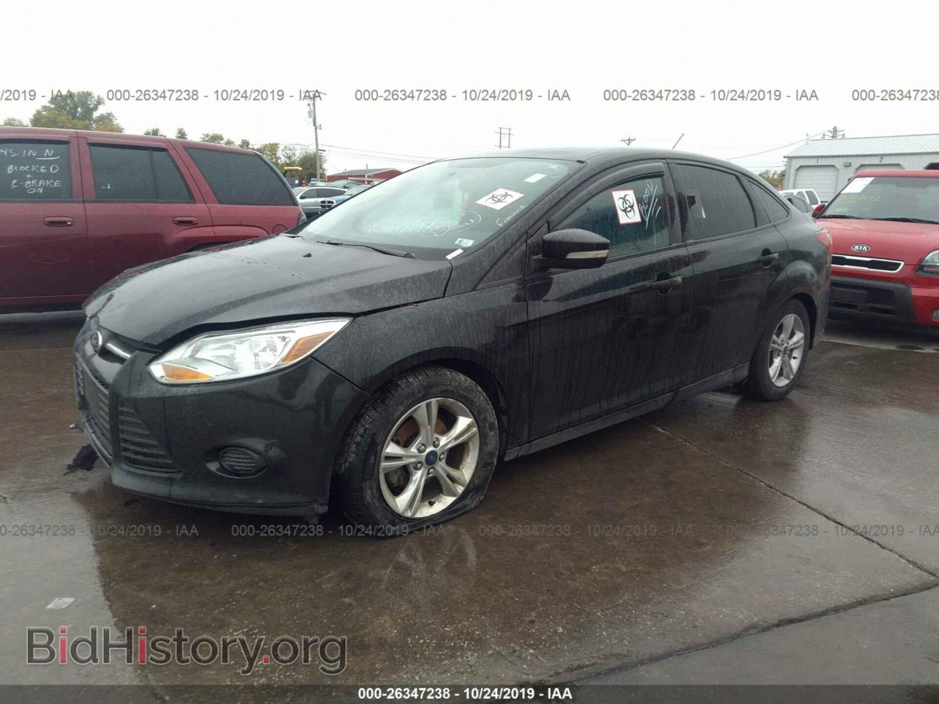 2014 Ford Focus - VIN: 1FADP3F28EL259385 - Photo 2