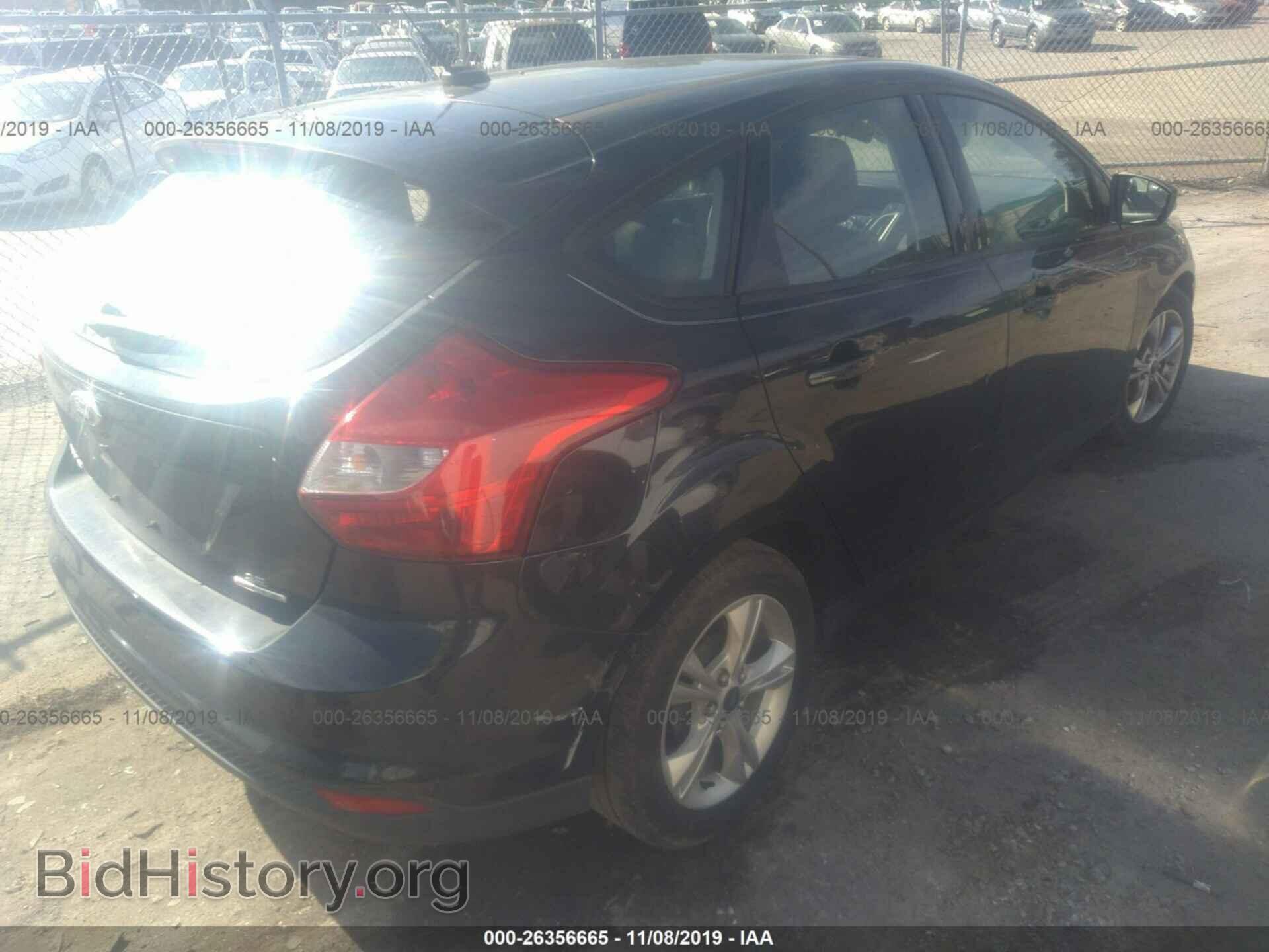 2014 Ford Focus - VIN: 1FADP3K22EL126448 - Фото 4