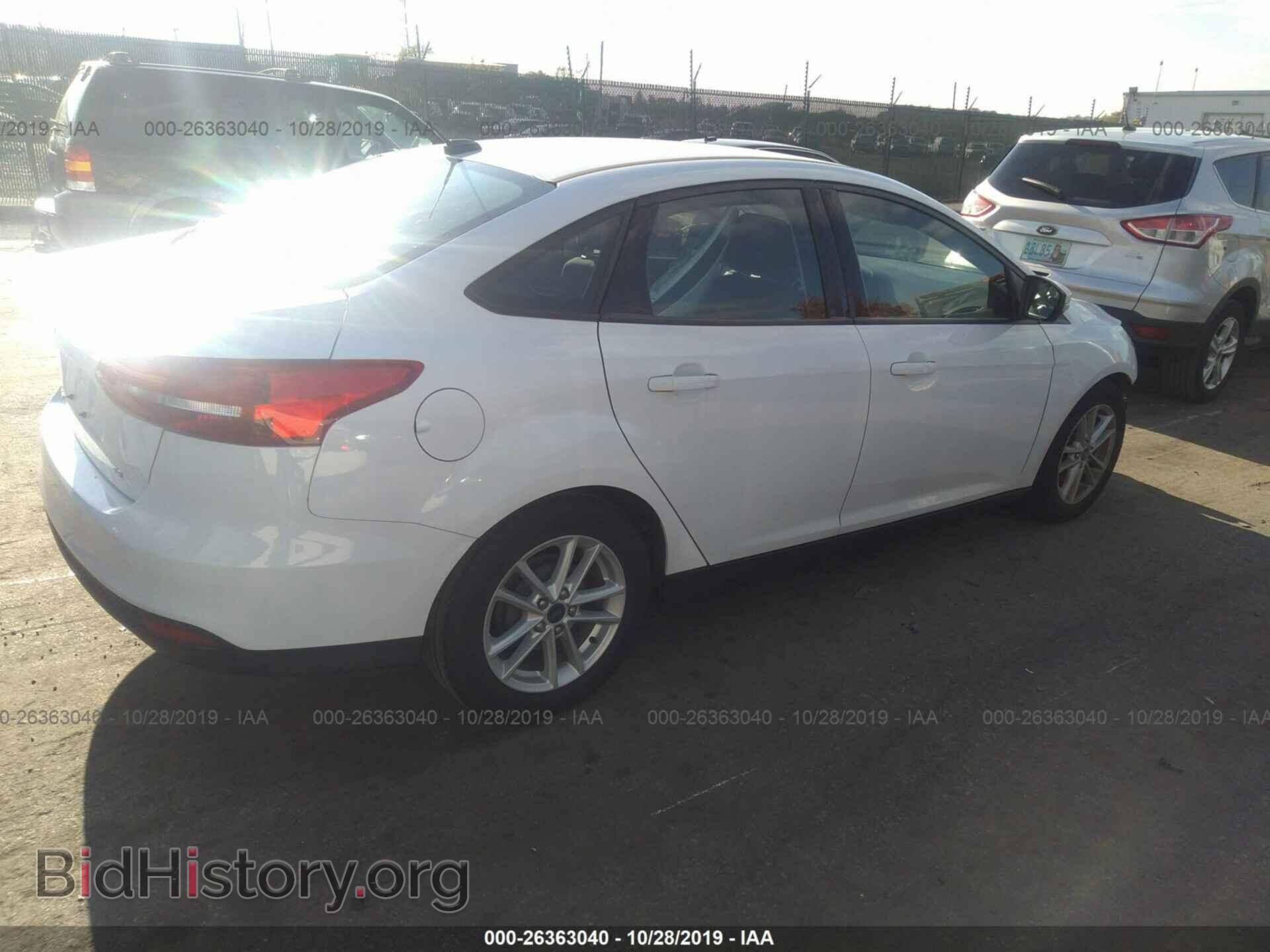 2016 FORD FOCUS - VIN: 1FADP3F22GL401264 - Photo 4