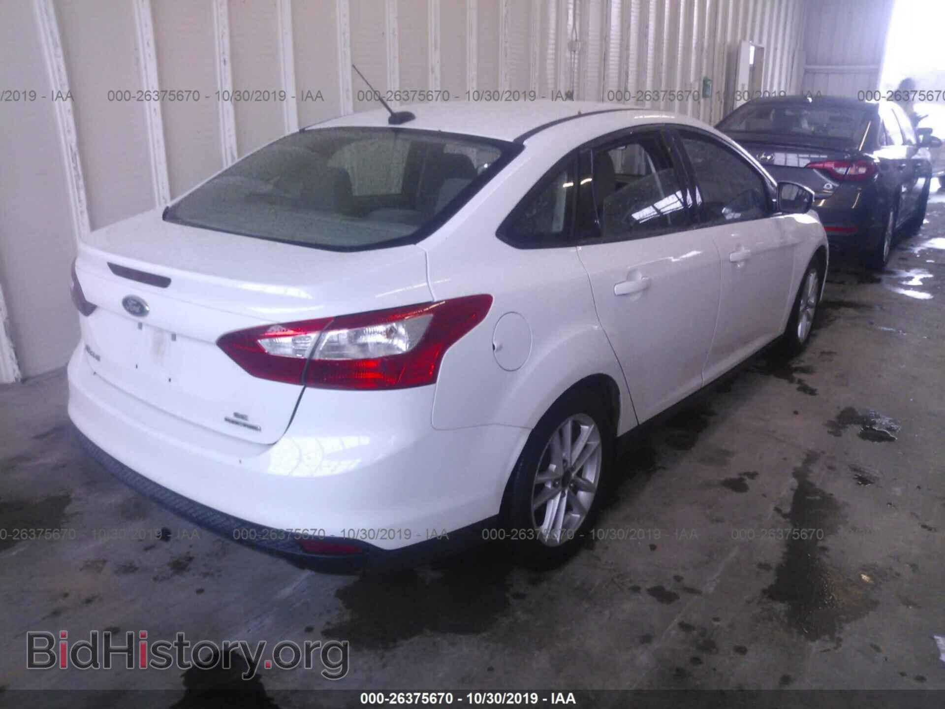 2014 FORD FOCUS - VIN: 1FADP3F20EL134817 - Photo 4