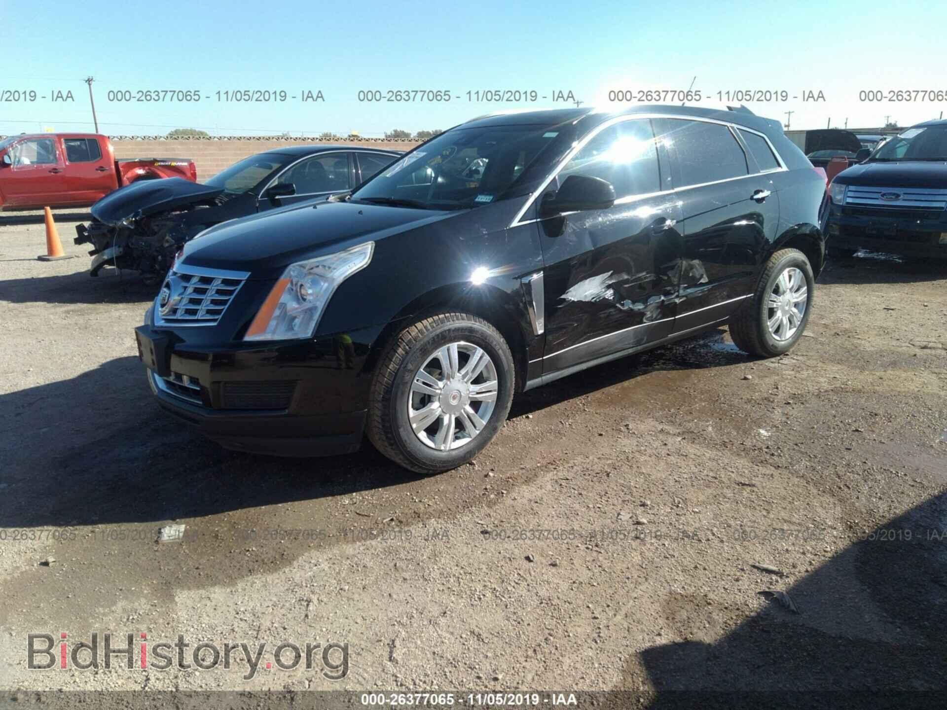2014 CADILLAC SRX - VIN: 3GYFNBE37ES578391 - Фото 2