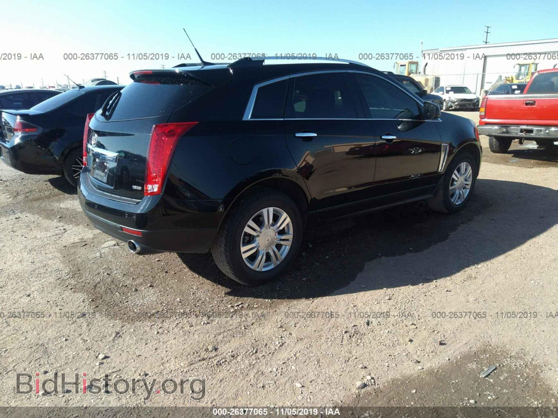 2014 CADILLAC SRX - VIN: 3GYFNBE37ES578391 - Фото 4