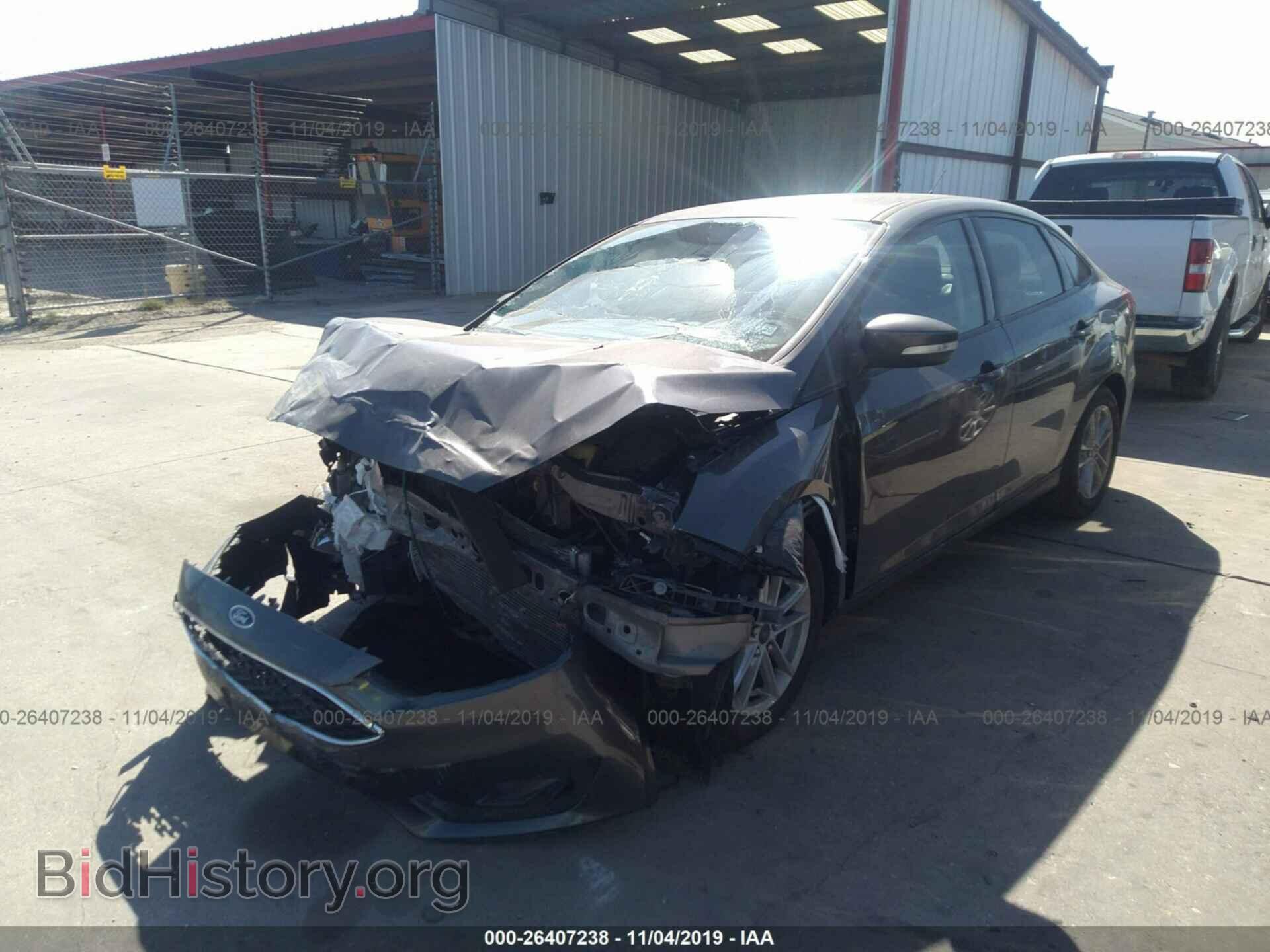 2016 FORD FOCUS - VIN: 1FADP3F21GL275317 - Фото 2