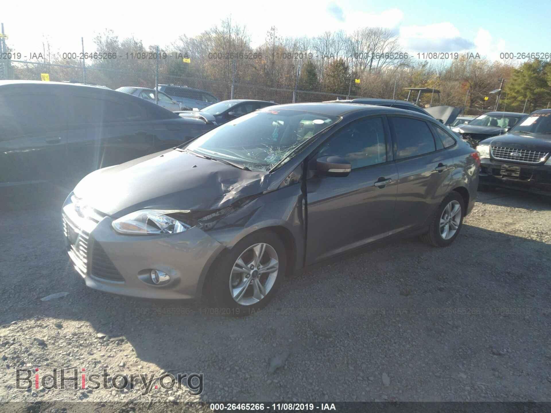 2012 Ford Focus - VIN: 1FAHP3F24CL322948 - Photo 2