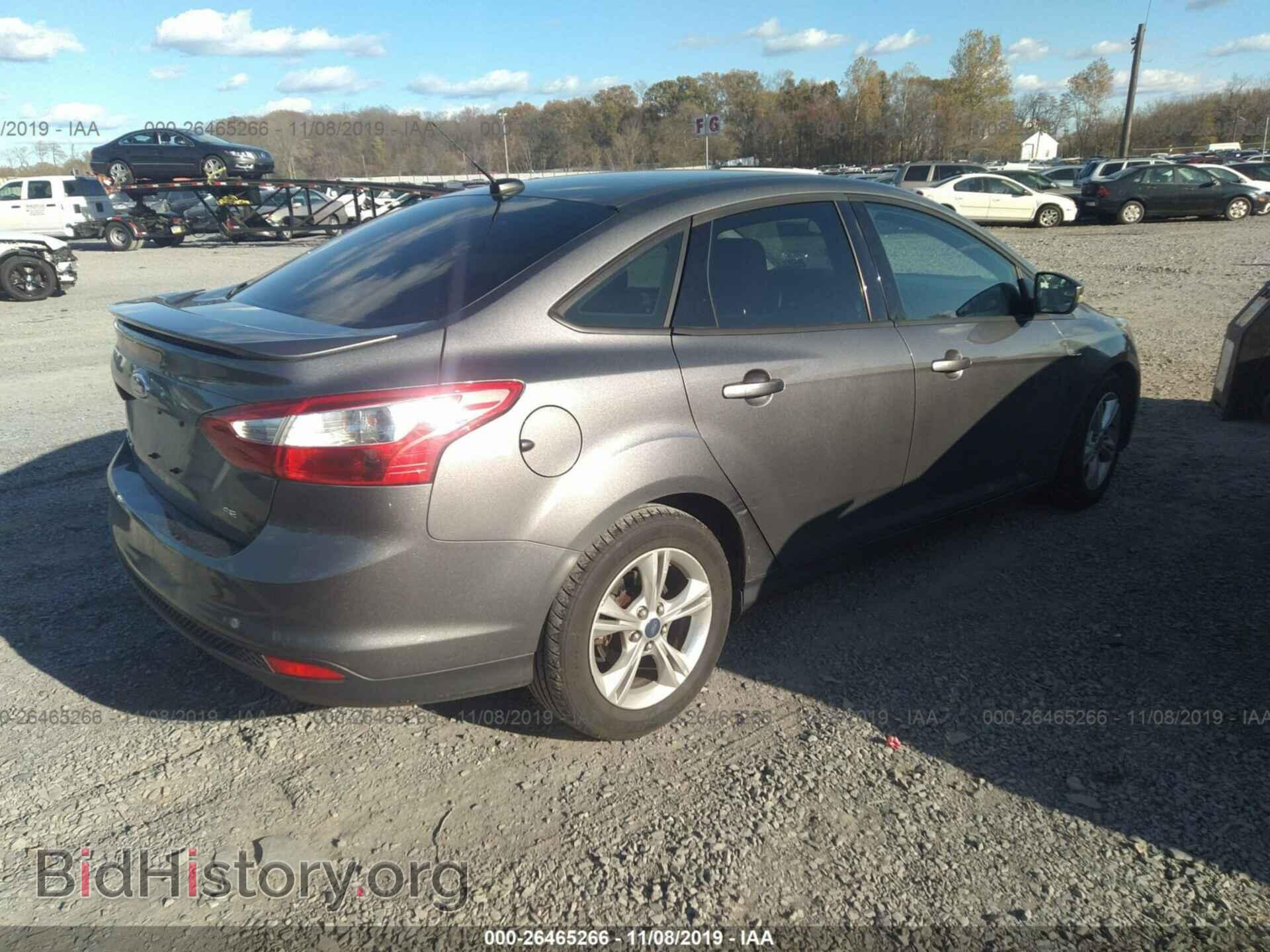 2012 Ford Focus - VIN: 1FAHP3F24CL322948 - Photo 4