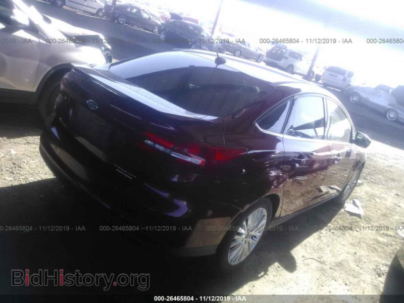 2016 Ford FOCUS (VIN 1FADP3J2XGL374533) — фото 4 из 10