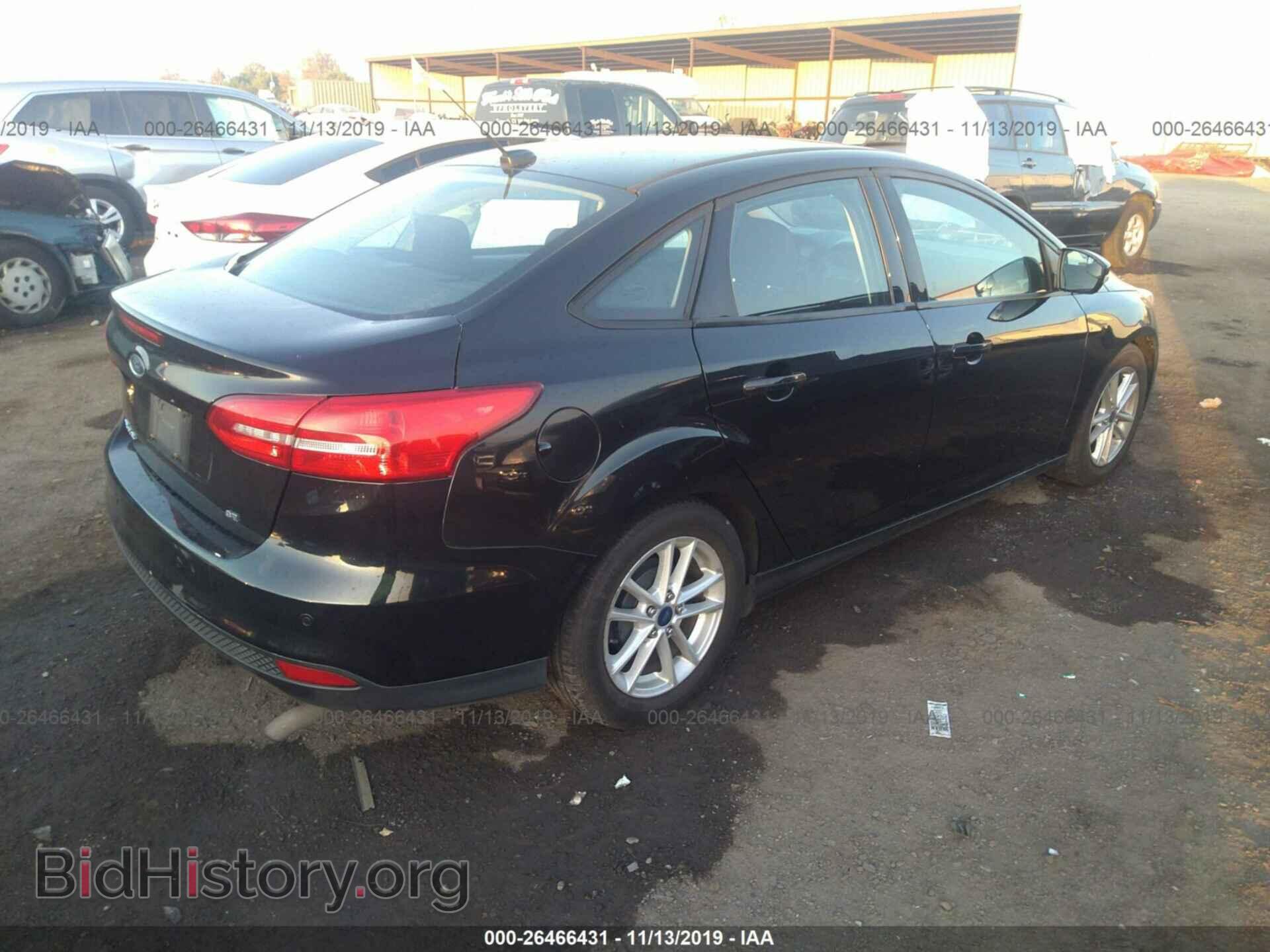 2015 FORD FOCUS - VIN: 1FADP3F27FL369409 - Photo 4
