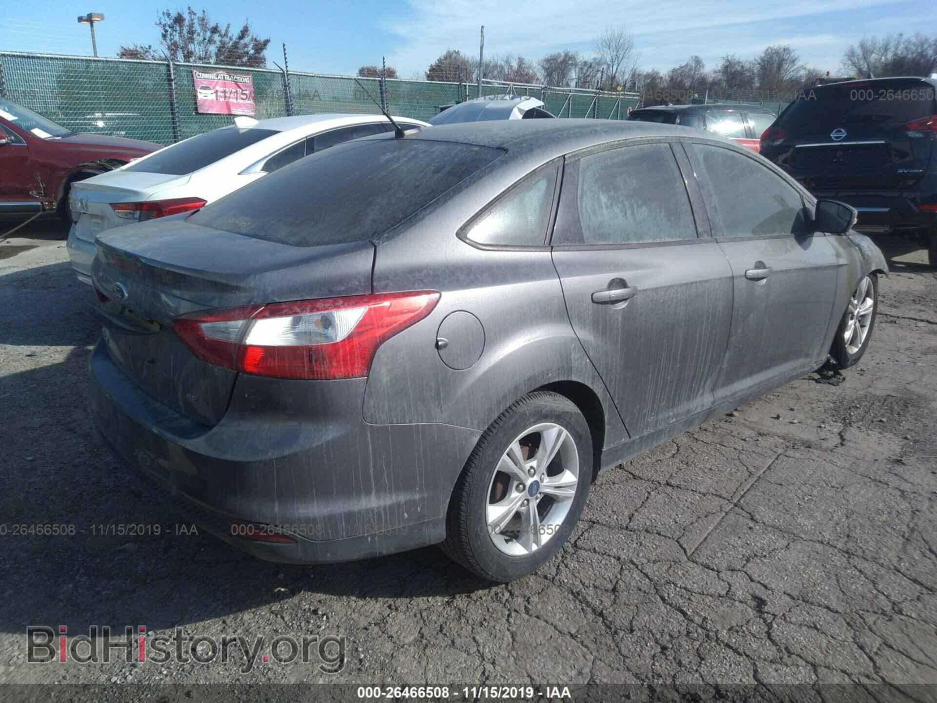 2014 Ford Focus - VIN: 1FADP3F23EL2326 - Photo 4