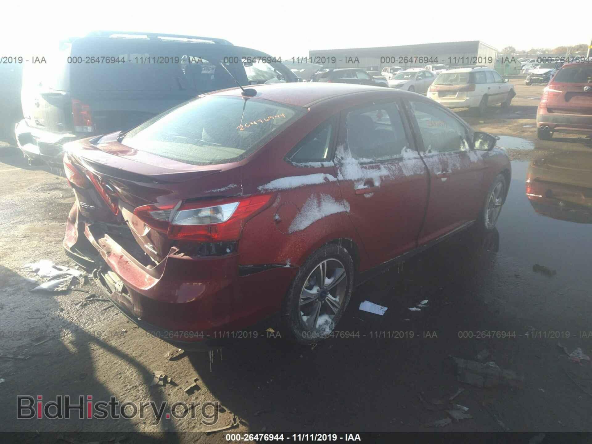 2014 Ford Focus - VIN: 1FADP3F2XEL381794 - Photo 4