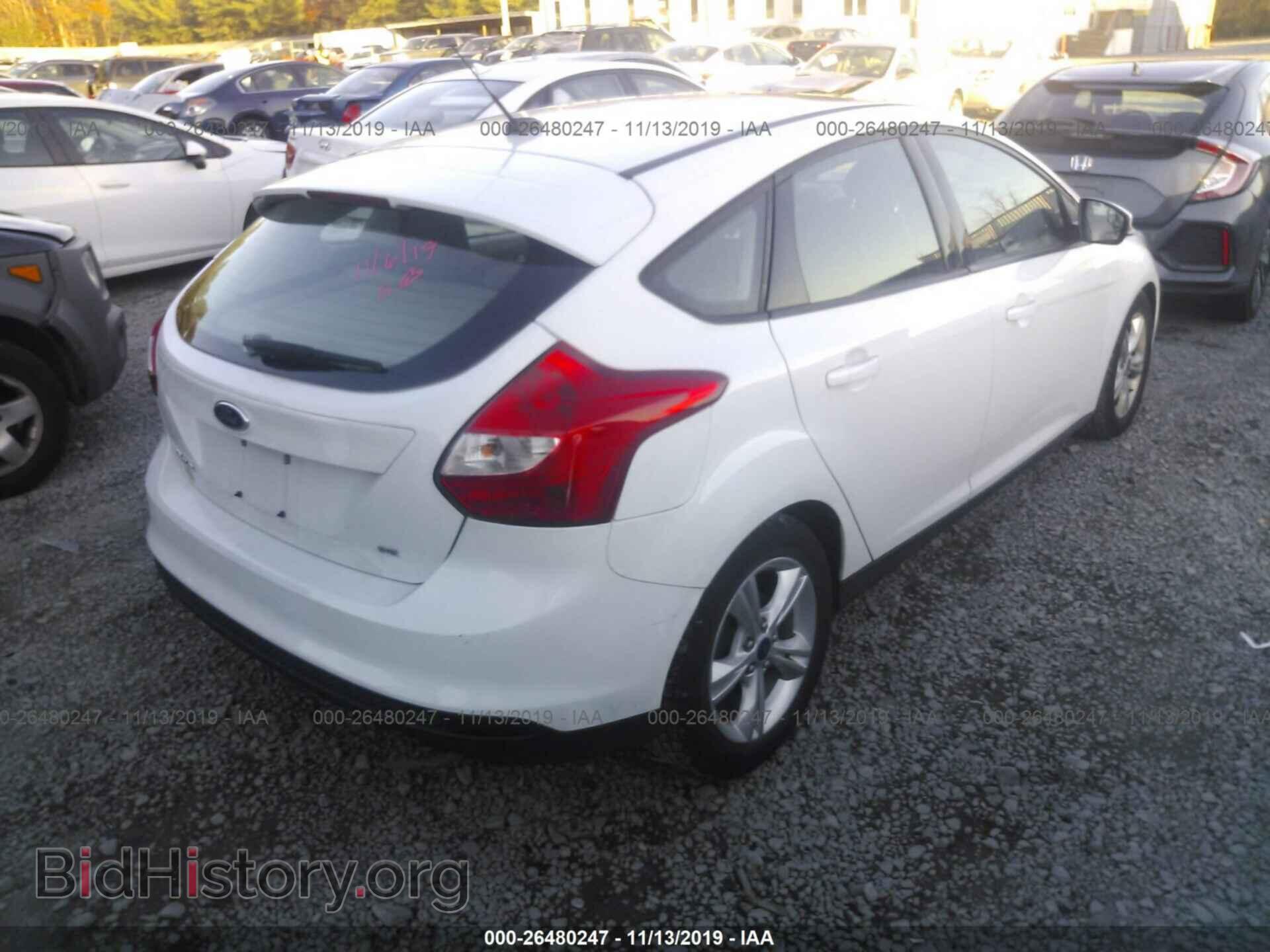 2014 Ford Focus - VIN: 1FADP3K29EL244688 - Фото 4