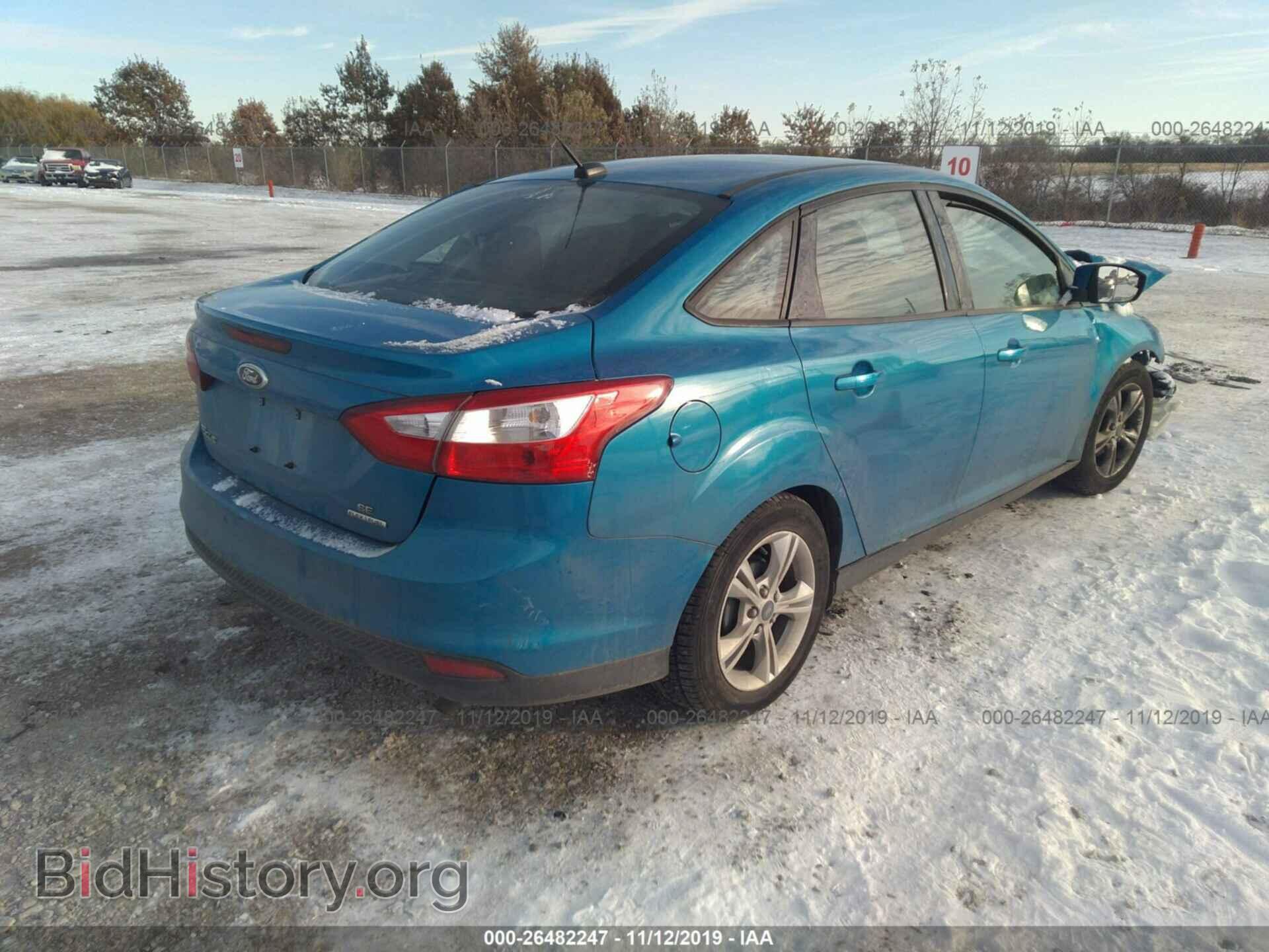 2014 FORD FOCUS - VIN: 1FADP3F2XEL137613 - Photo 4