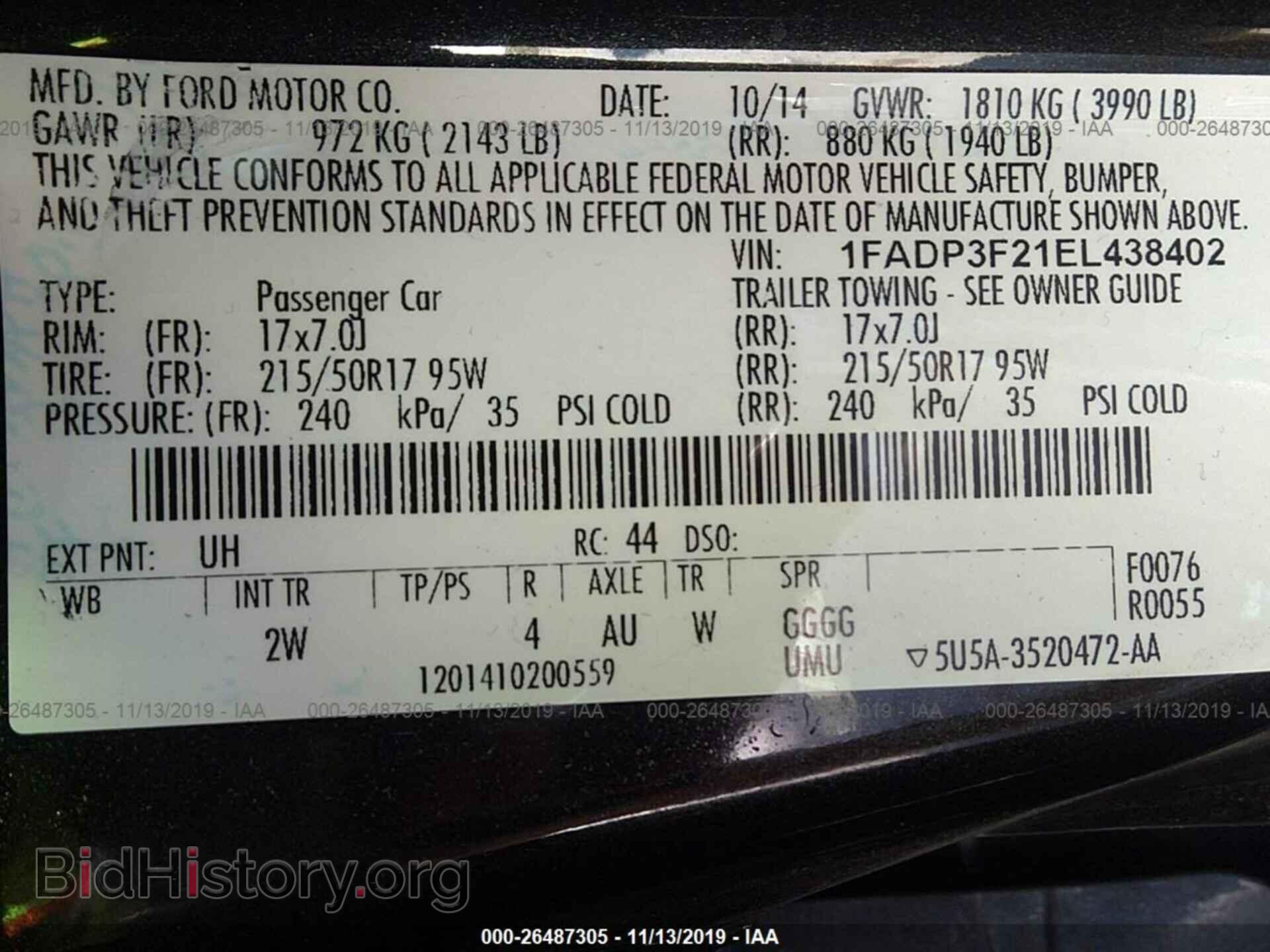 2014 Ford Focus - VIN: 1FADP3F21EL438402 - Photo 9