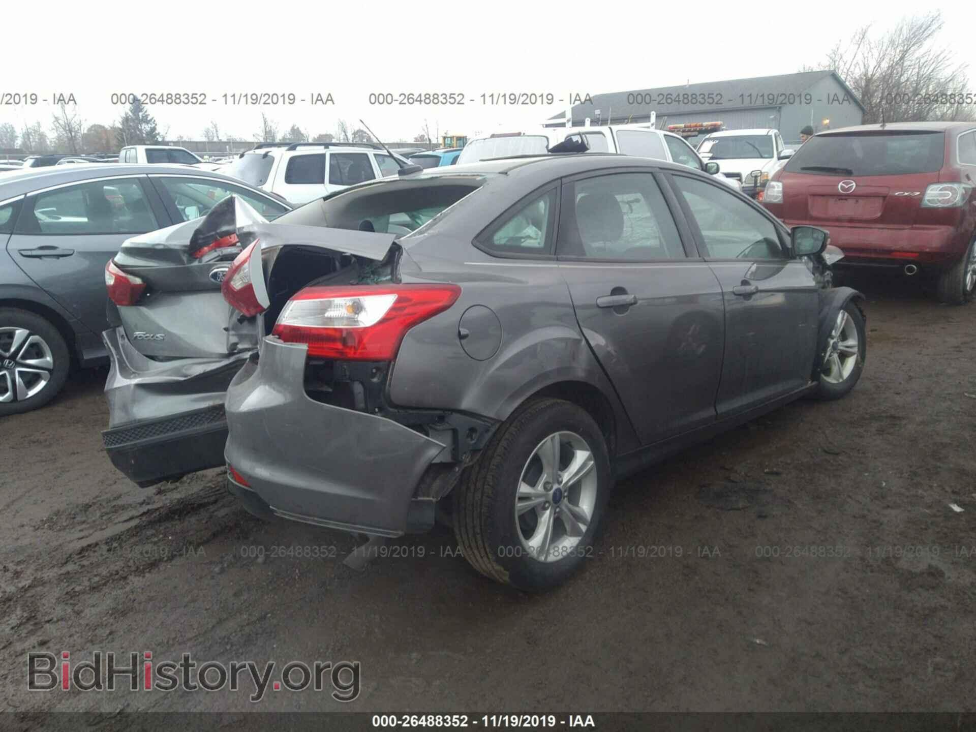 2014 Ford Focus - VIN: 1FADP3F26EL380660 - Photo 4