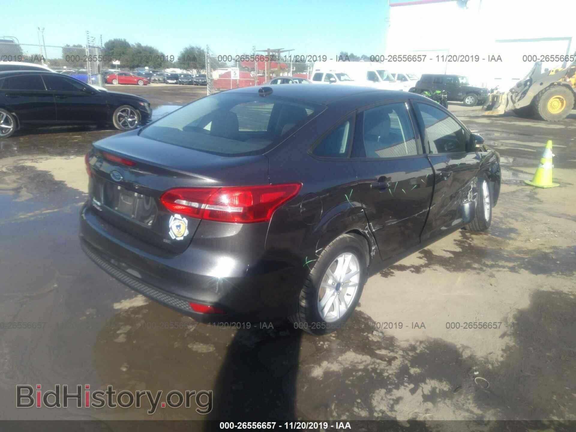 2017 Ford Focus - VIN: 1FADP3F24HL231121 - Photo 4