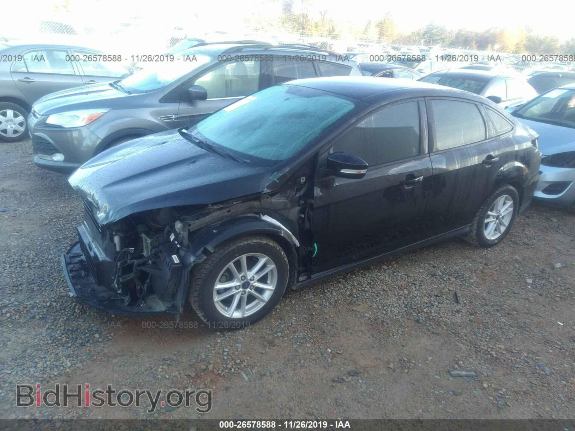 2016 Ford Focus - VIN: 1FADP3F2XGL304345 - Фото 2