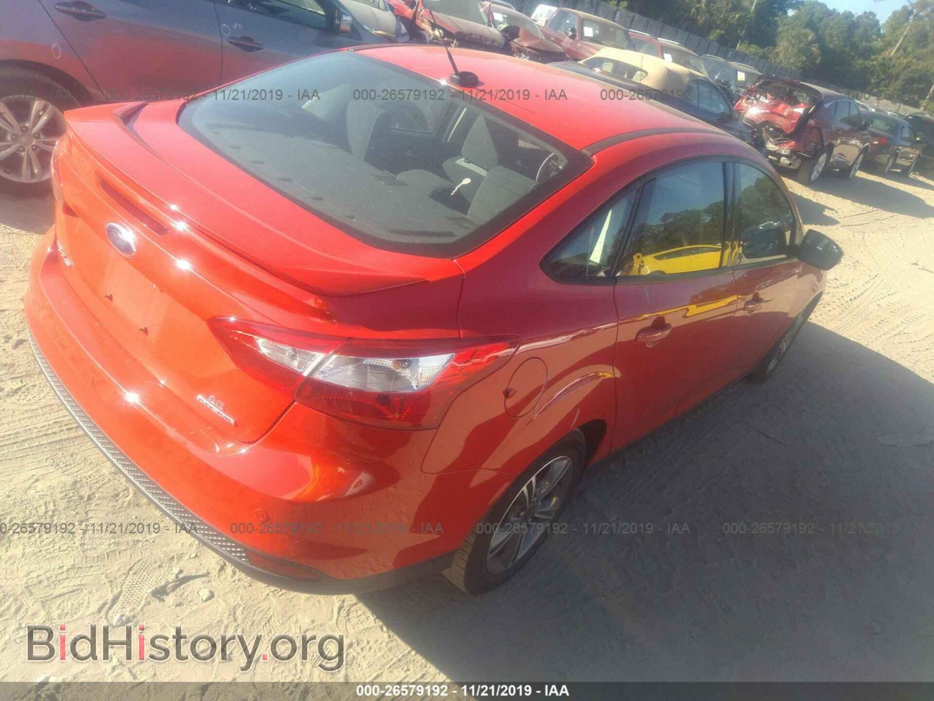 2014 Ford Focus - VIN: 1FADP3F21EL244243 - Photo 4