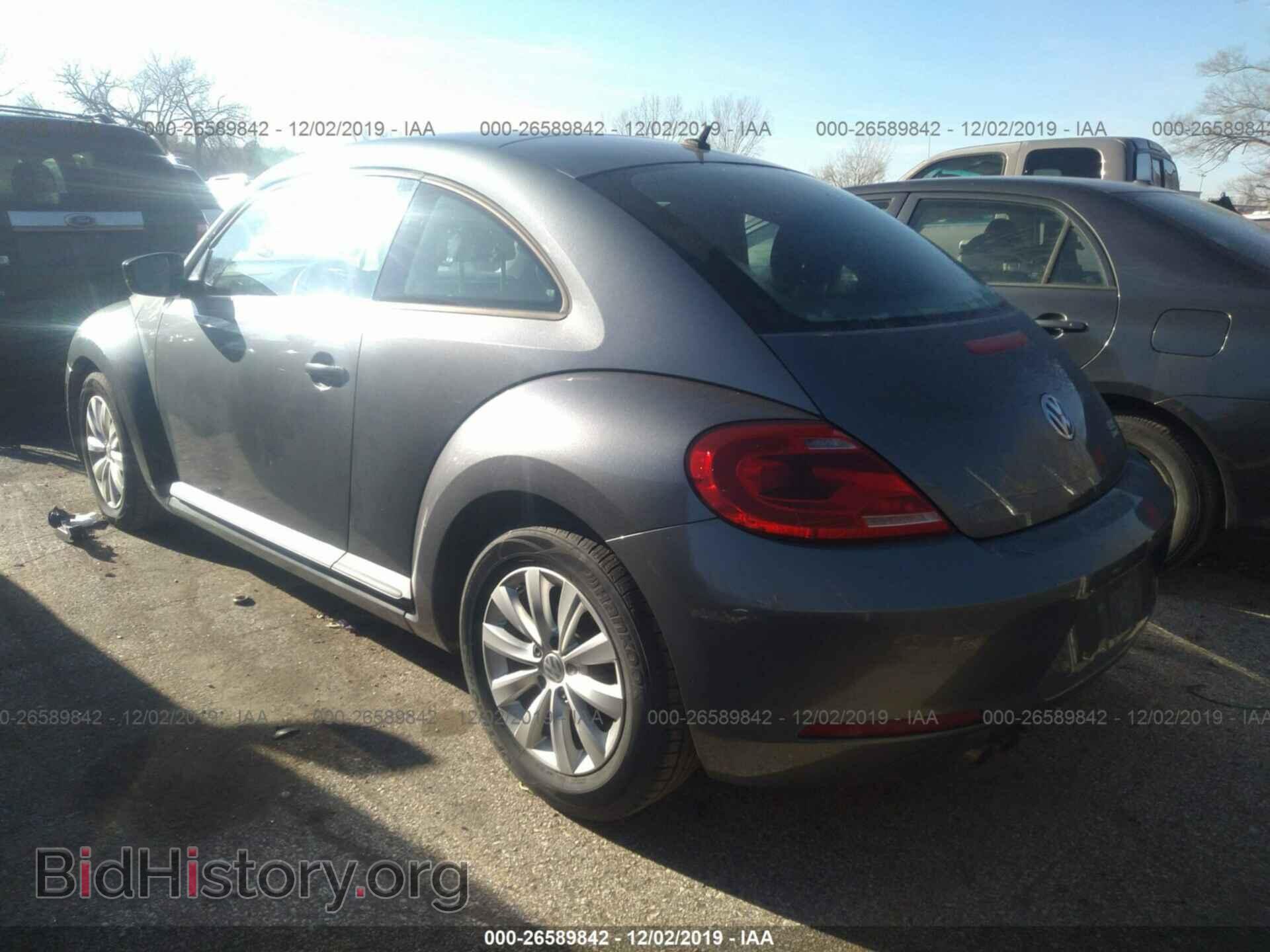 2014 Volkswagen Beetle - VIN: 3VWFP7AT5EM600957 - Фото 3