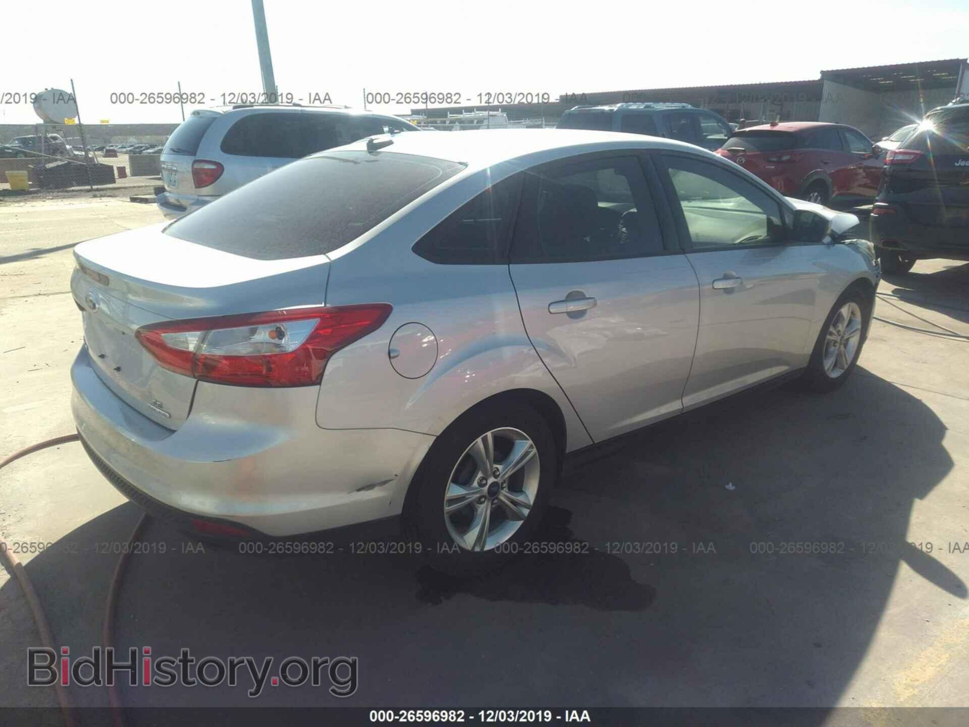 2014 Ford Focus - VIN: 1FADP3F26EL196383 - Фото 4