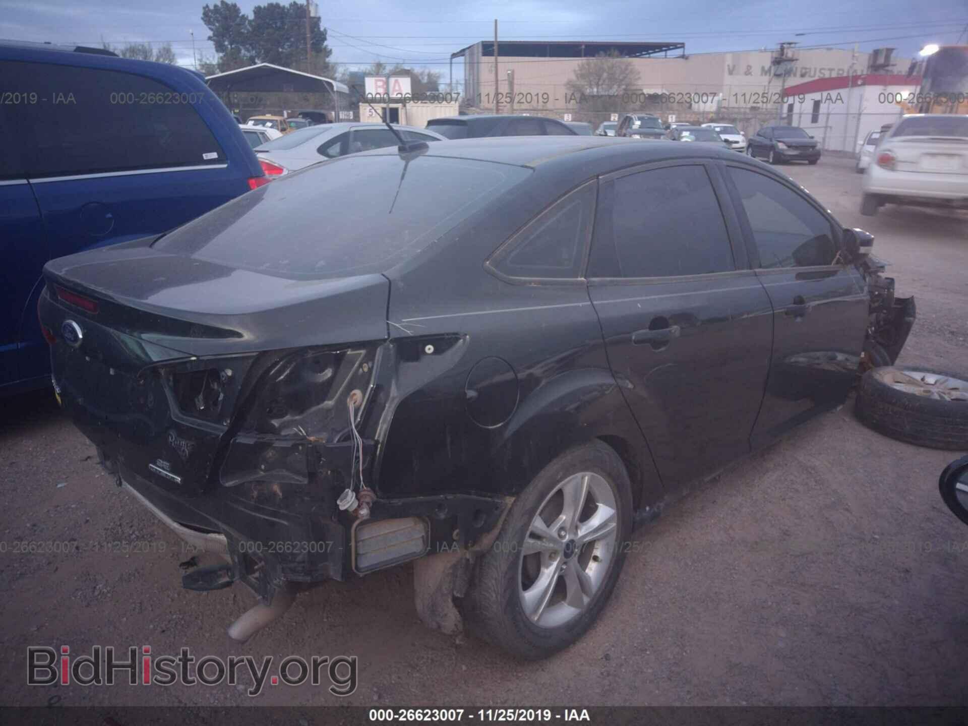 2014 Ford Focus - VIN: 1FADP3F22EL149271 - Photo 4