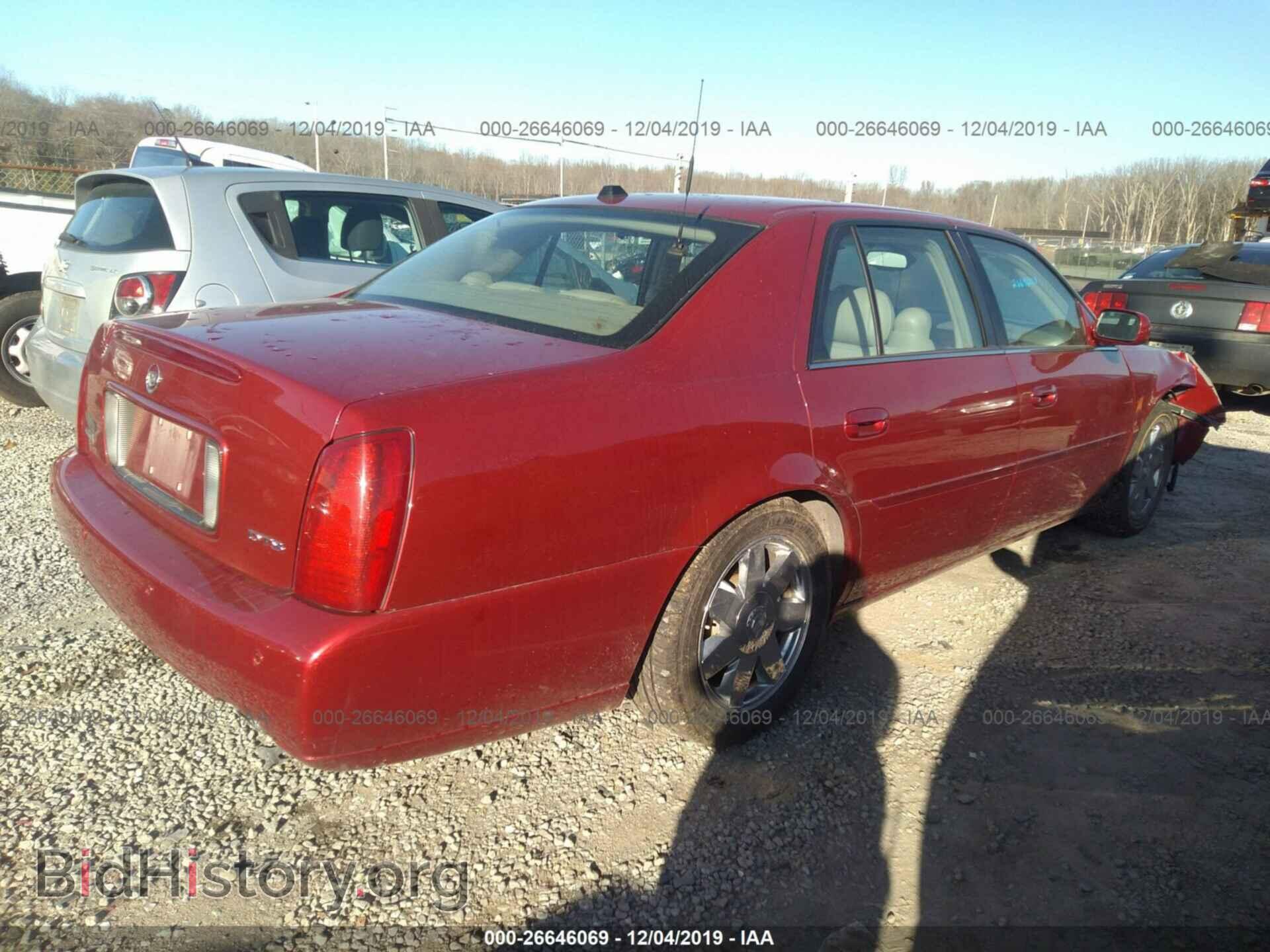 2004 Cadillac Deville - VIN: 1G6KF57924U187722 - Photo 4