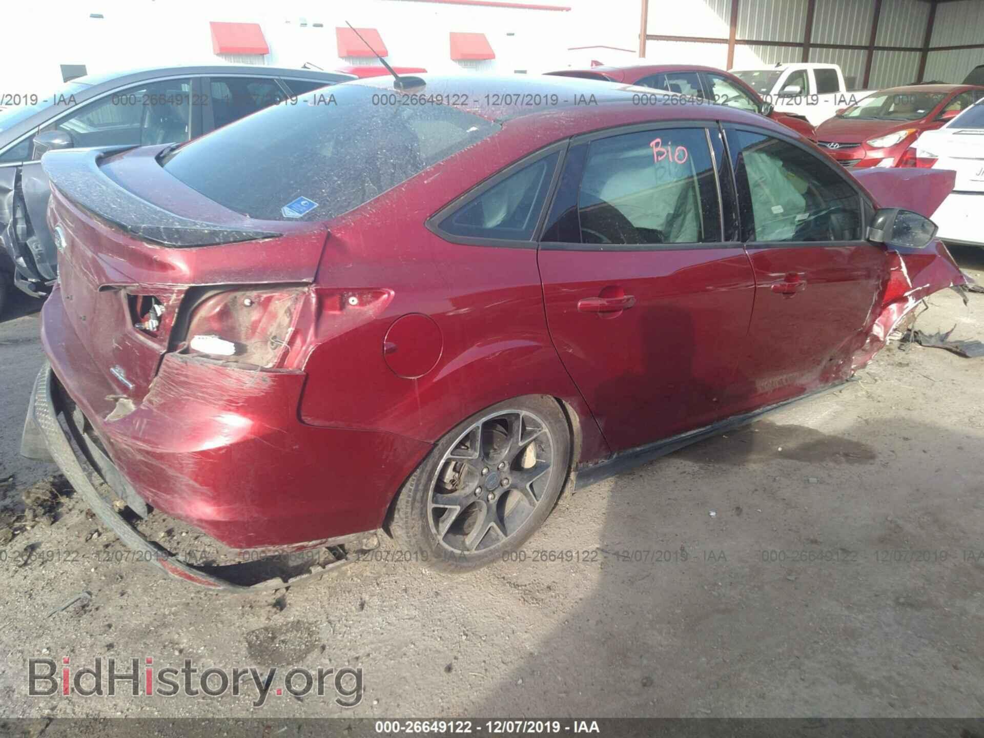2014 Ford Focus - VIN: 1FADP3F28EL372849 - Photo 4