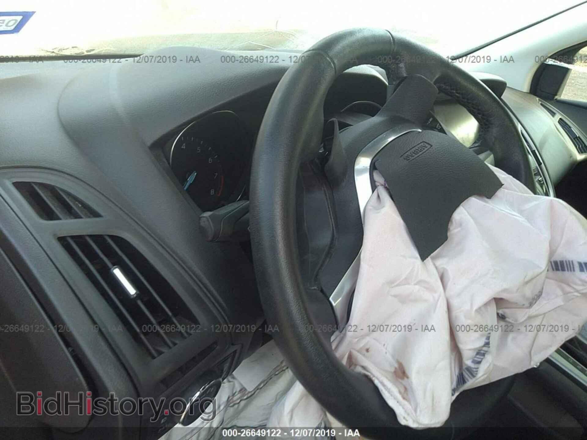 2014 Ford Focus - VIN: 1FADP3F28EL372849 - Photo 7