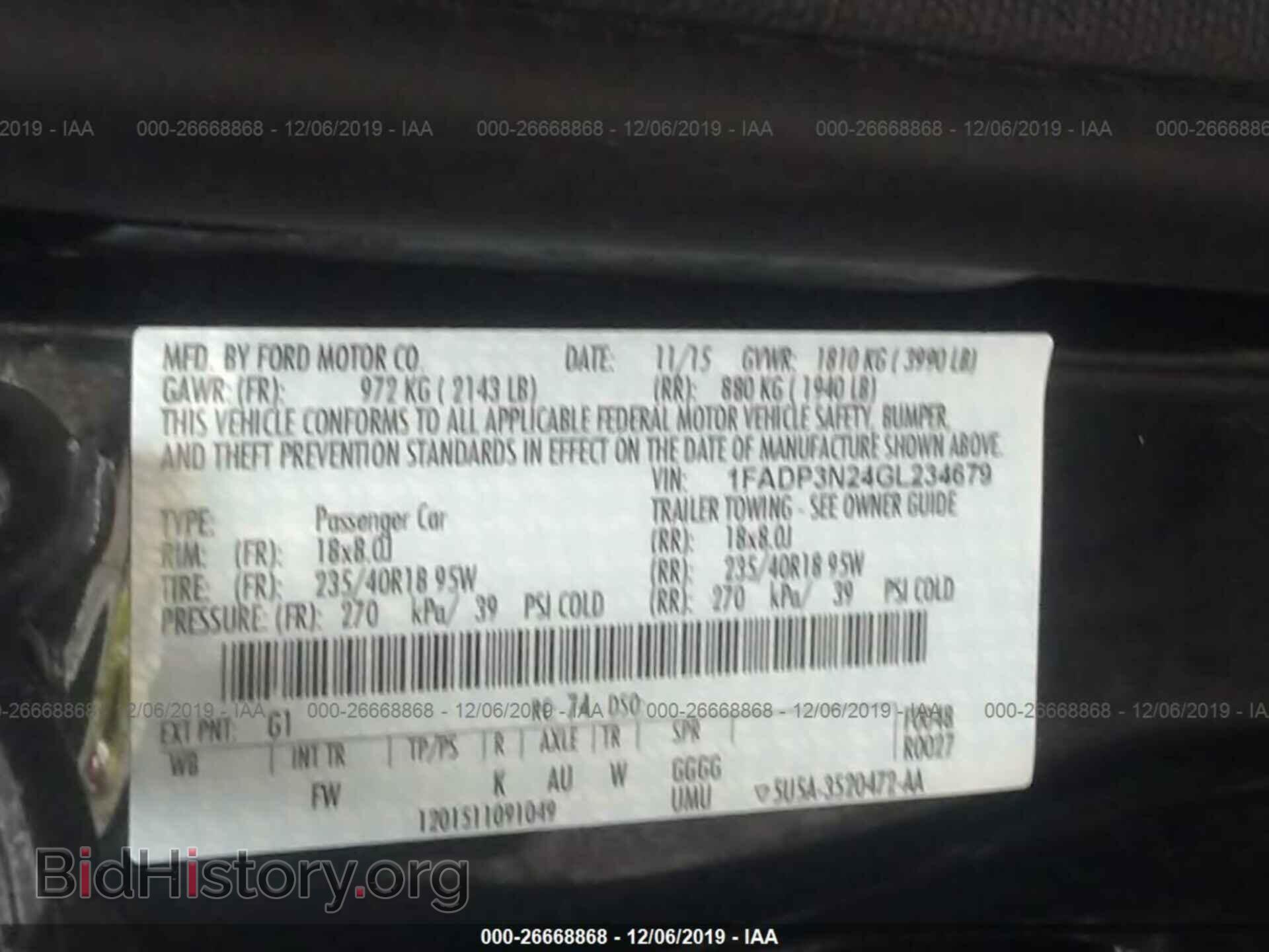 2016 FORD FOCUS - VIN: 1FADP3N24GL234679 - Фото 9