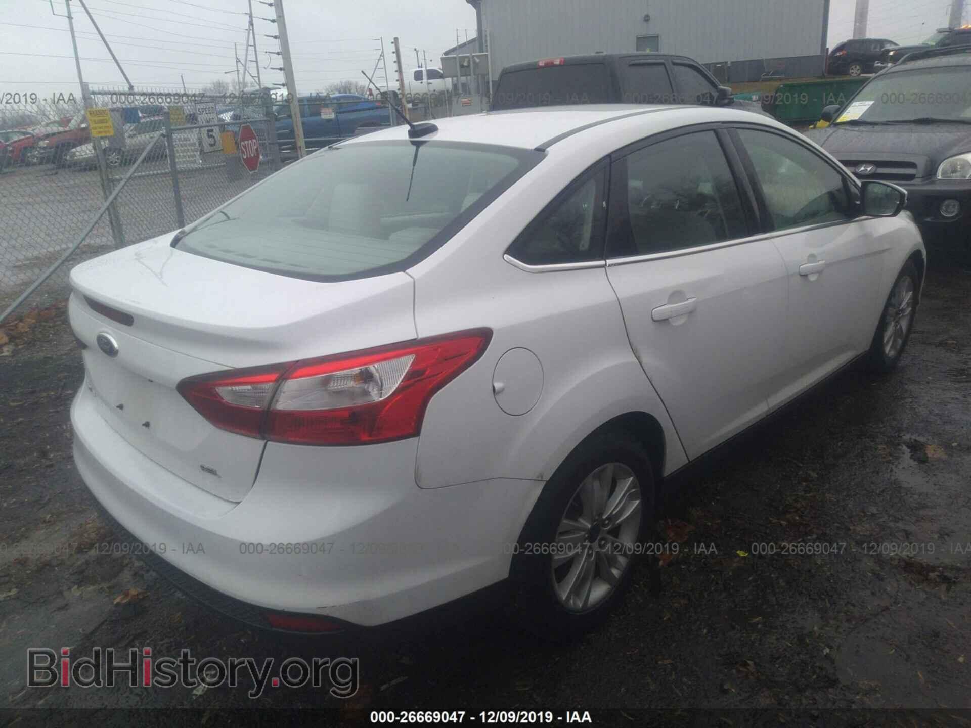 2012 Ford Focus - VIN: 1FAHP3H24CL338533 - Фото 4
