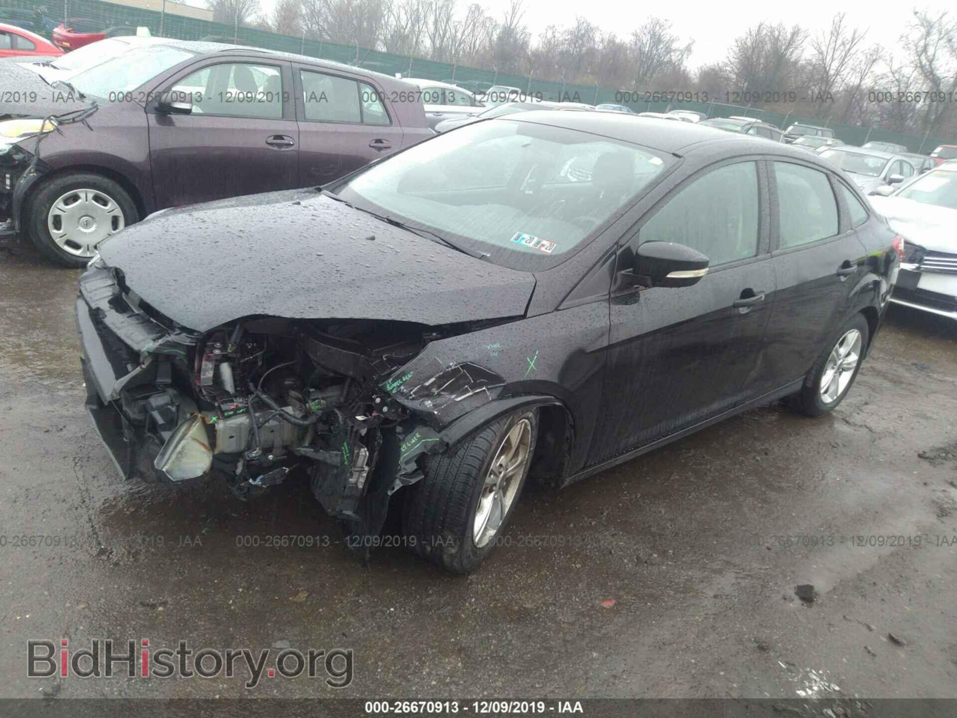 2014 Ford Focus - VIN: 1FADP3F23EL366599 - Photo 2