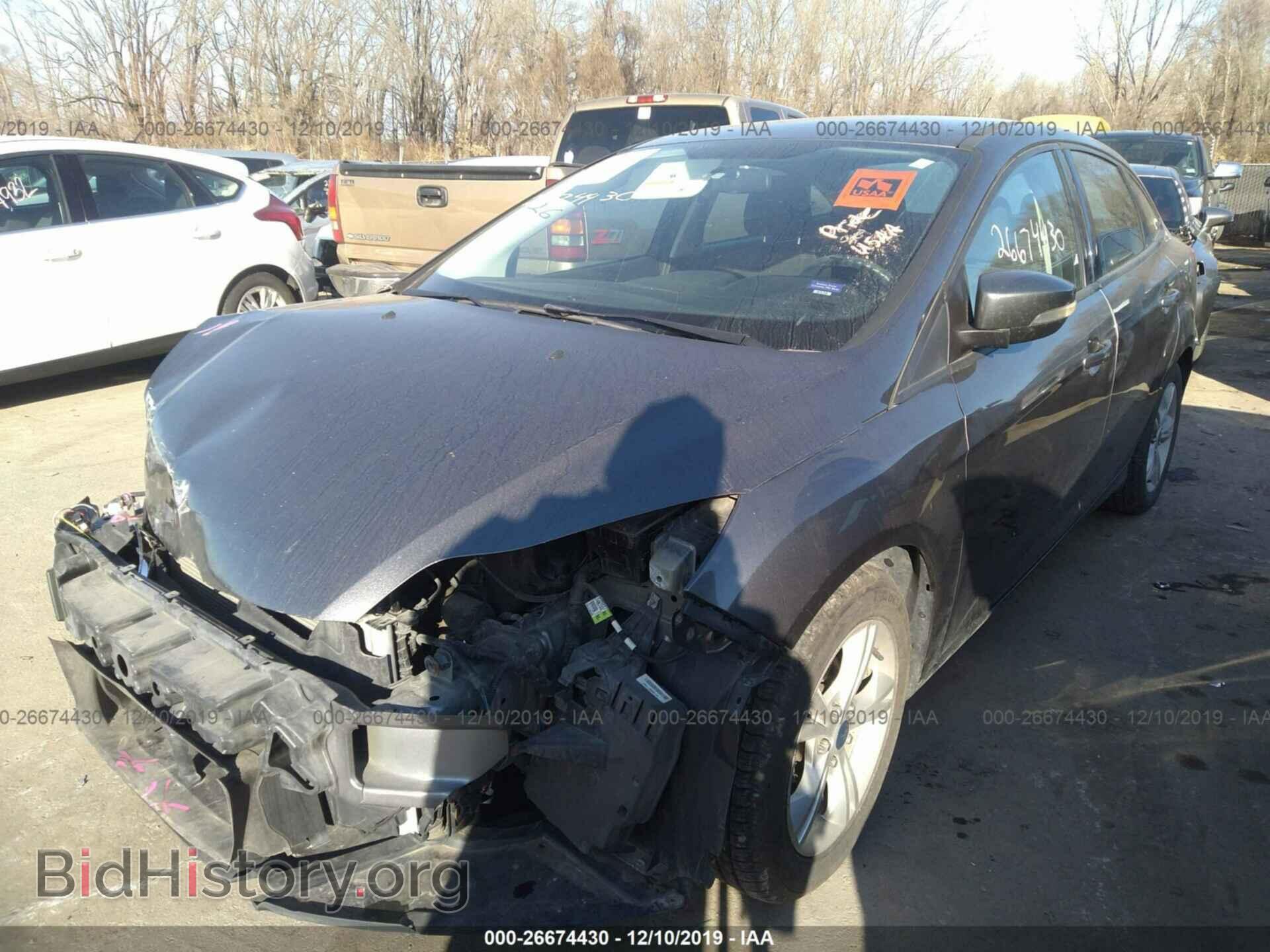2014 Ford Focus - VIN: 1FADP3F21EL438707 - Photo 2