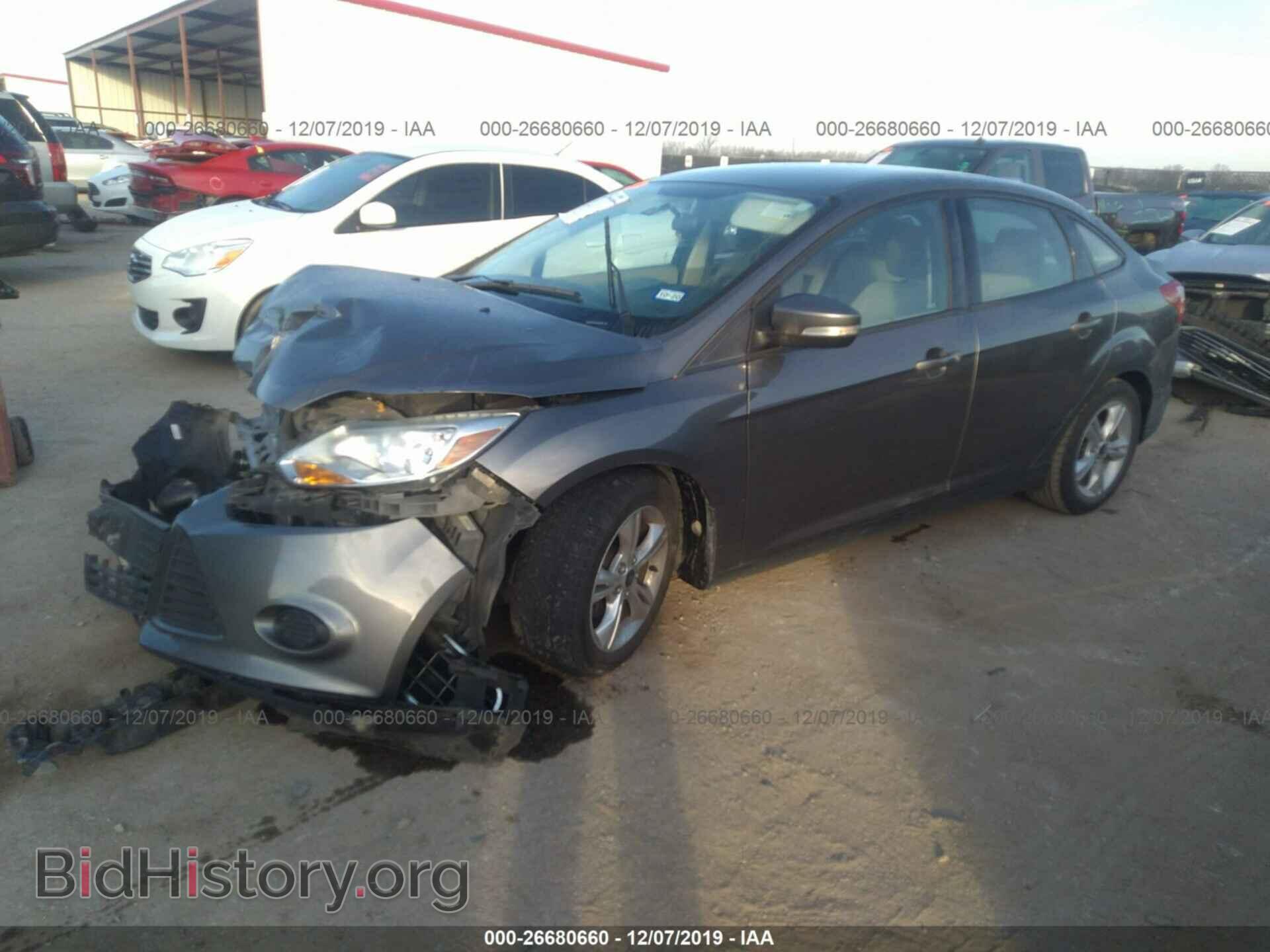 2014 Ford Focus - VIN: 1FADP3F20EL372280 - Фото 2