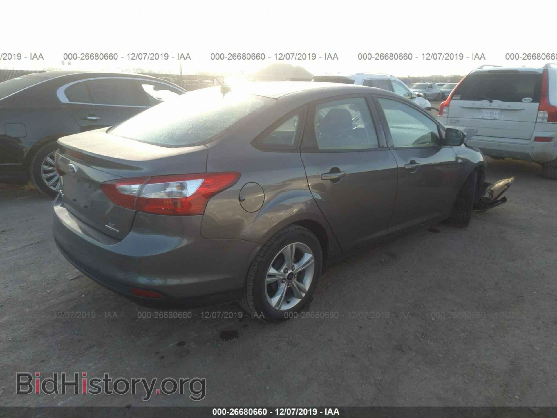 2014 Ford Focus - VIN: 1FADP3F20EL372280 - Фото 4