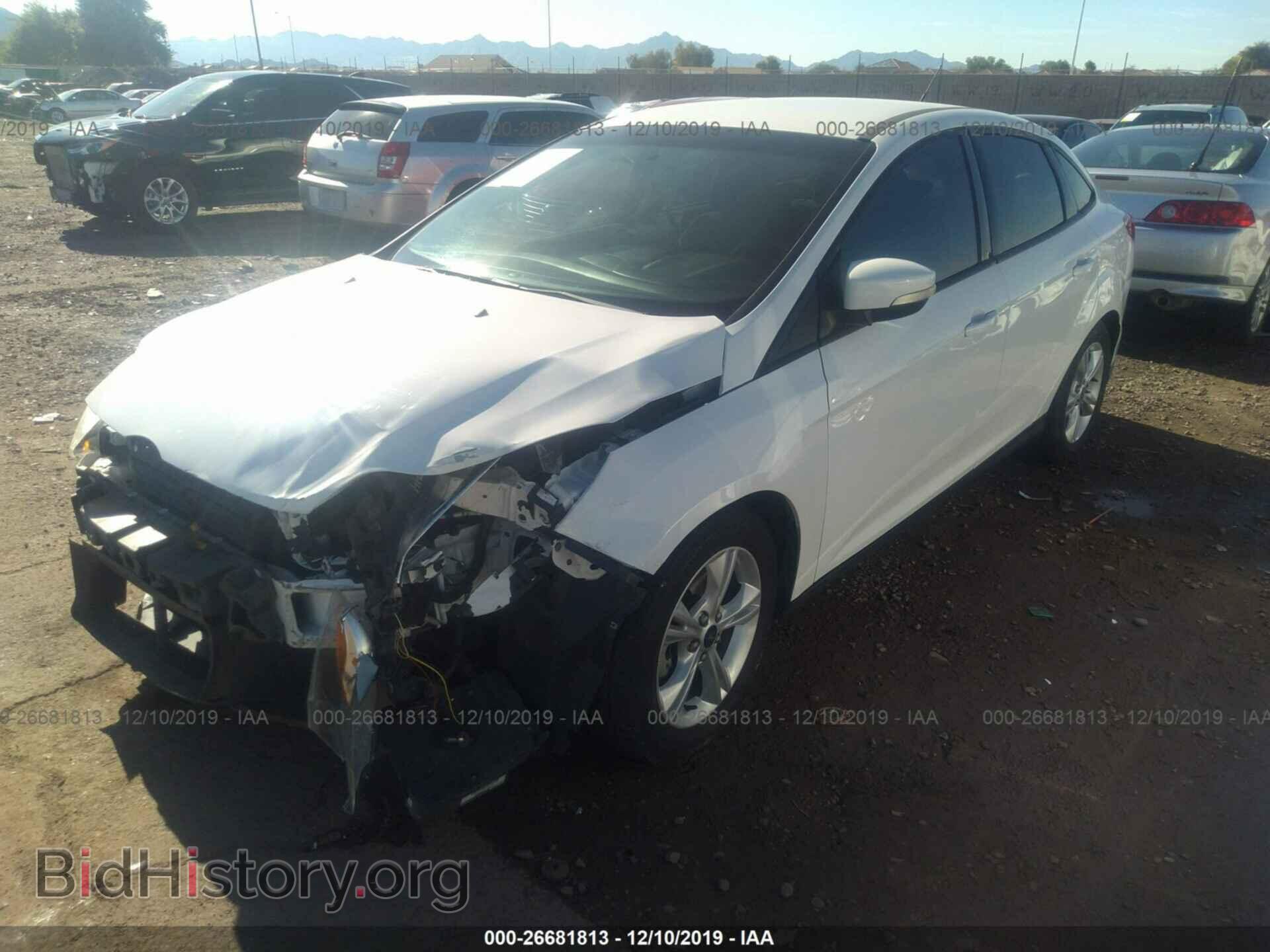 2014 Ford Focus - VIN: 1FADP3F21EL453773 - Photo 2