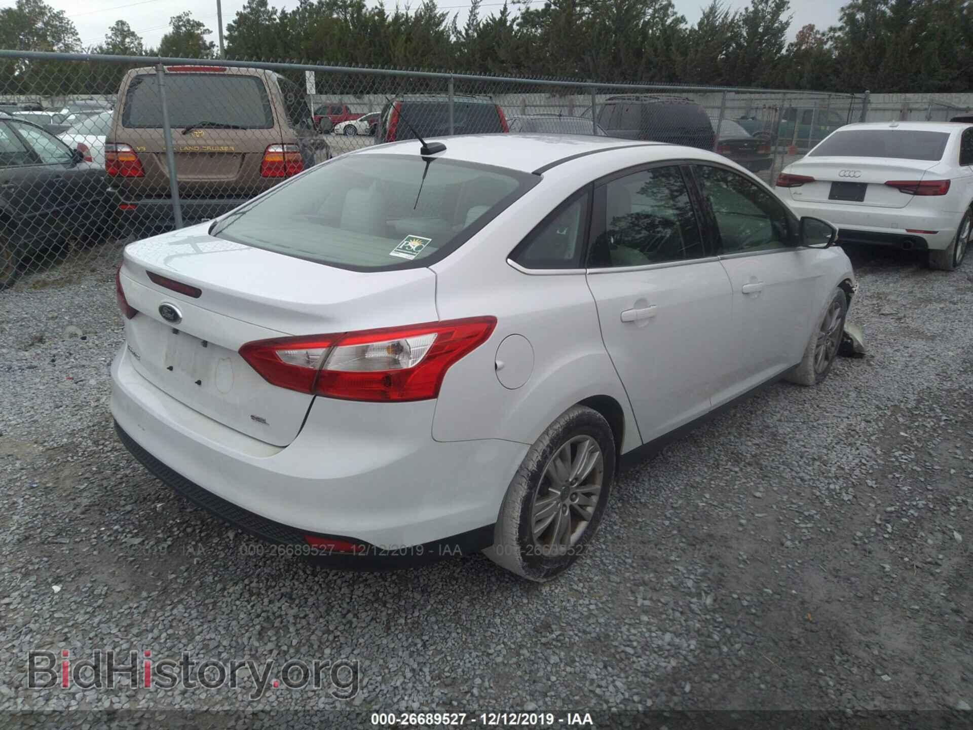 2012 Ford Focus - VIN: 1FAHP3H26CL201027 - Фото 4