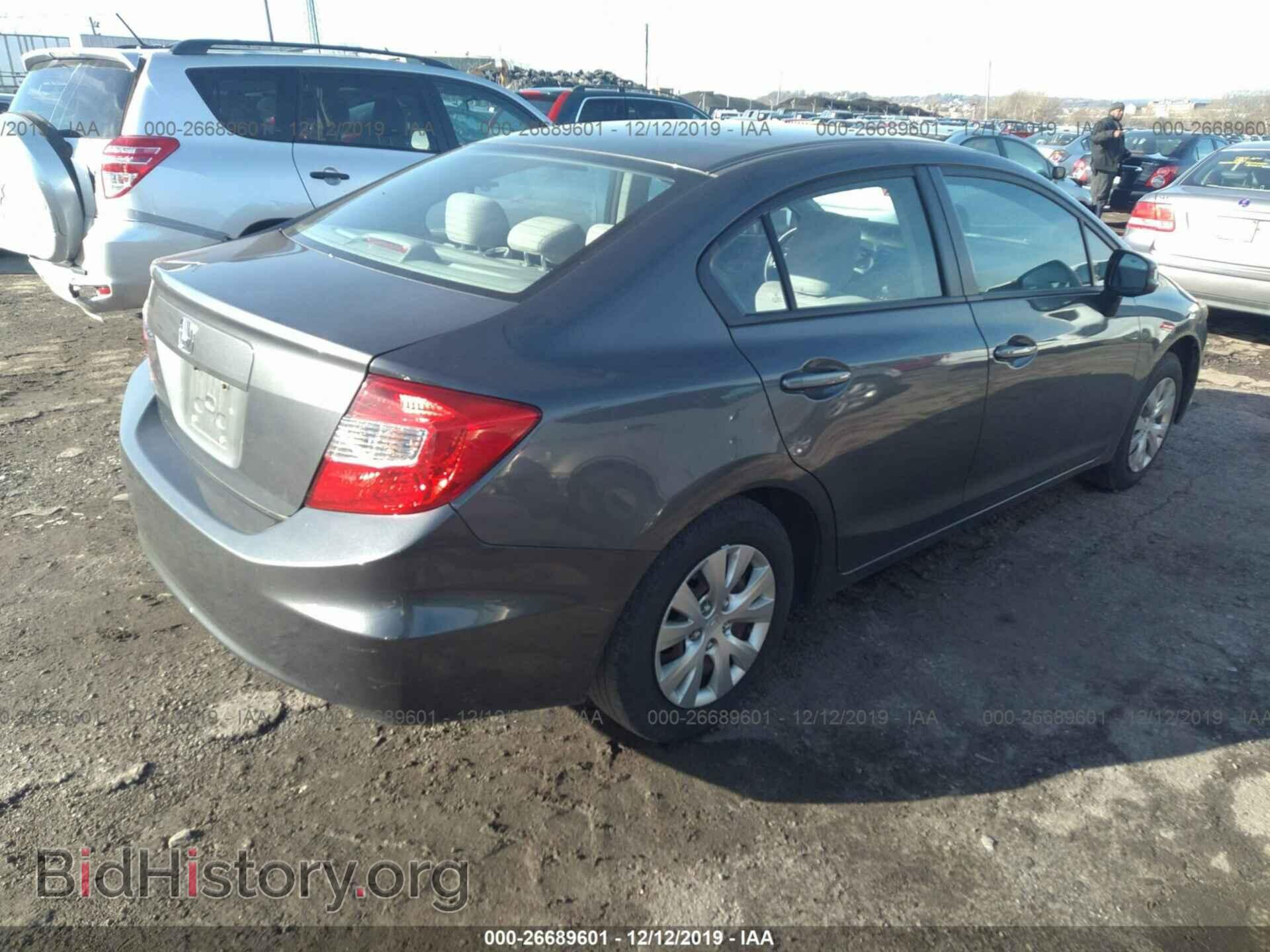 2012 Honda Civic - VIN: 2HGFB2E59CH561559 - Photo 4