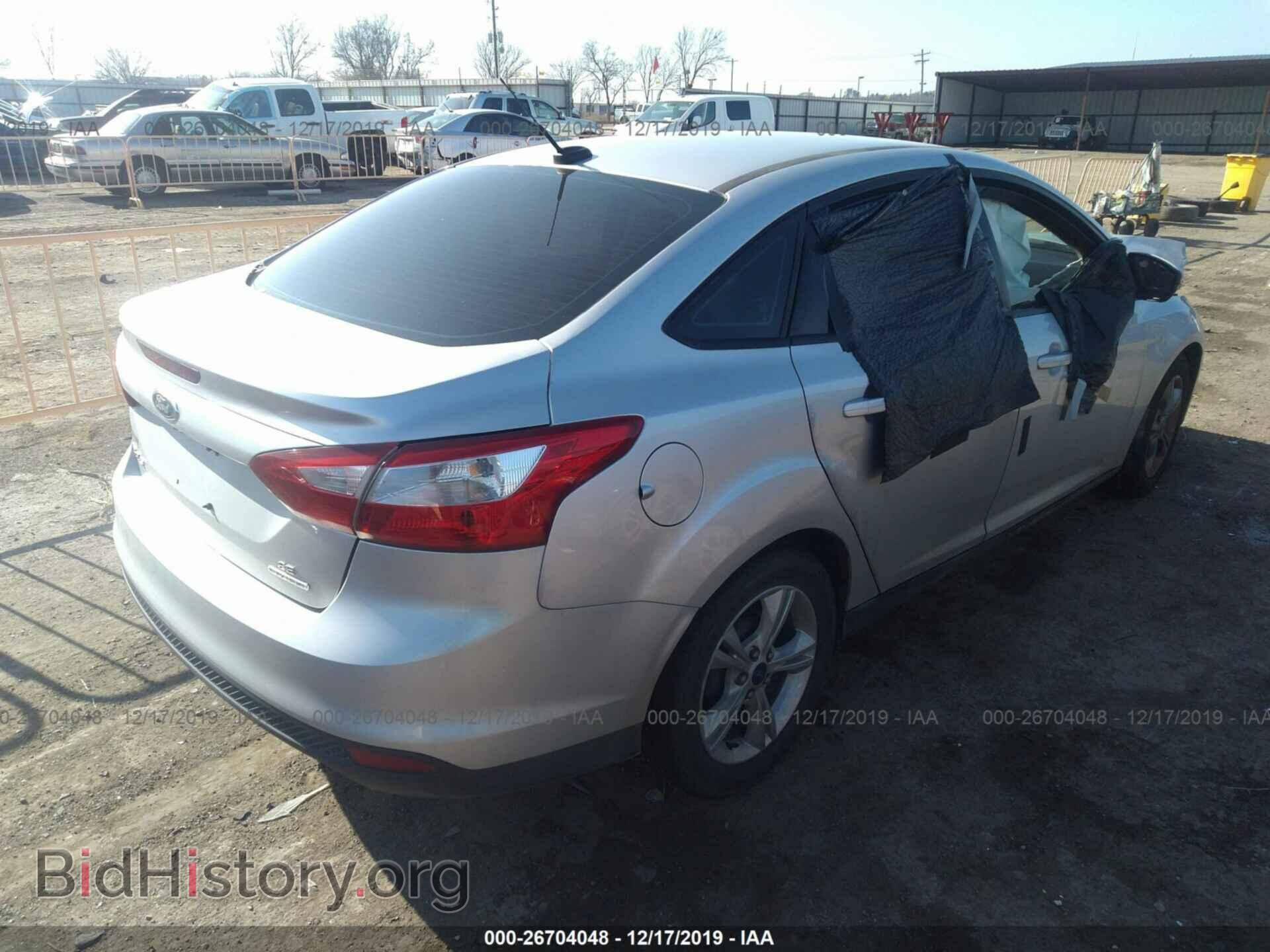 2014 Ford Focus - VIN: 1FADP3F22EL390733 - Фото 4