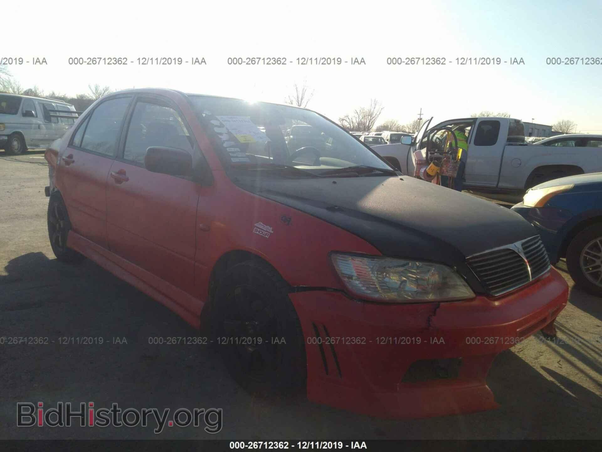 Фотография JA3AJ26E33U035675 - MITSUBISHI LANCER 2003