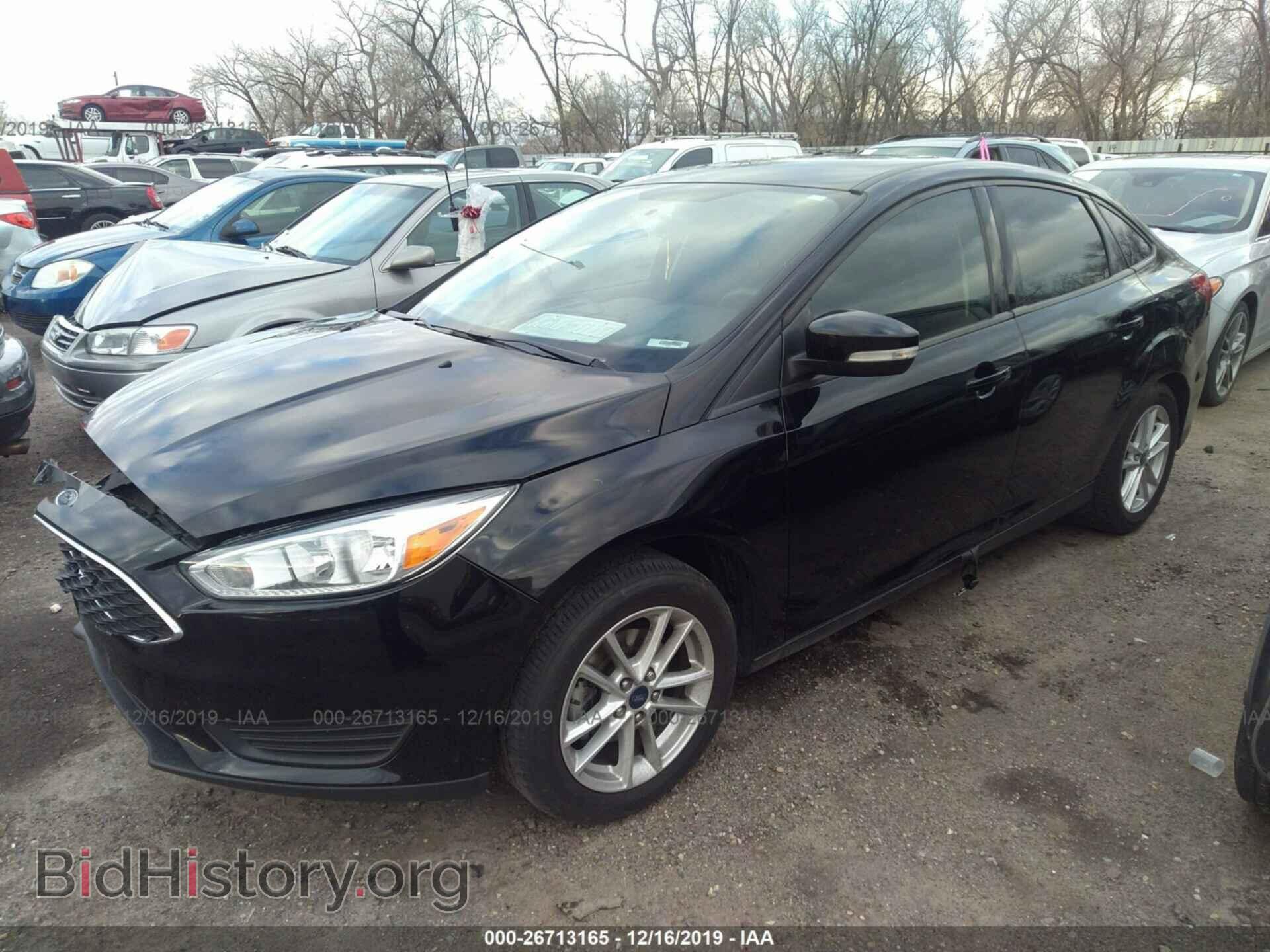 2016 FORD FOCUS - VIN: 1FADP3F22GL379654 - Фото 2