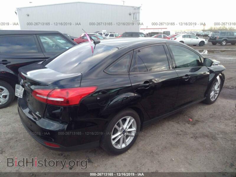 2016 Ford FOCUS (VIN 1FADP3F22GL379654) — фото 4 из 11