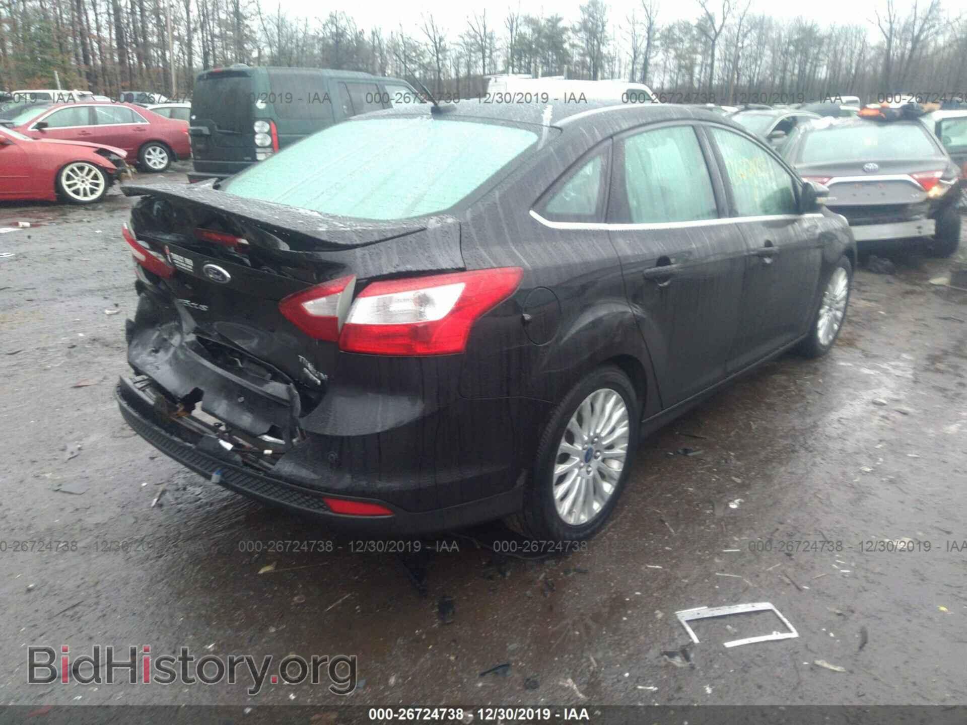 2012 Ford Focus - VIN: 1FAHP3J22CL382170 - Фото 4