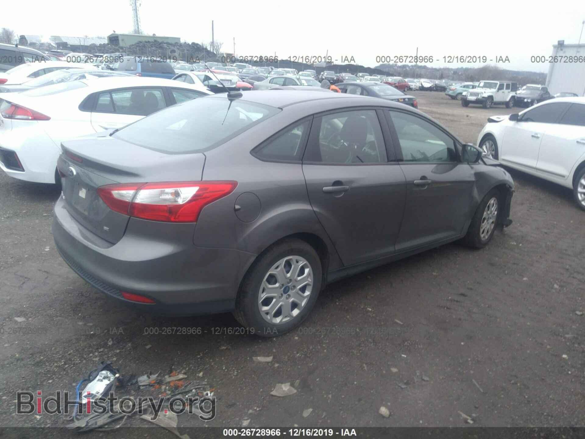 2012 Ford Focus - VIN: 1FAHP3F2XCL217458 - Photo 4